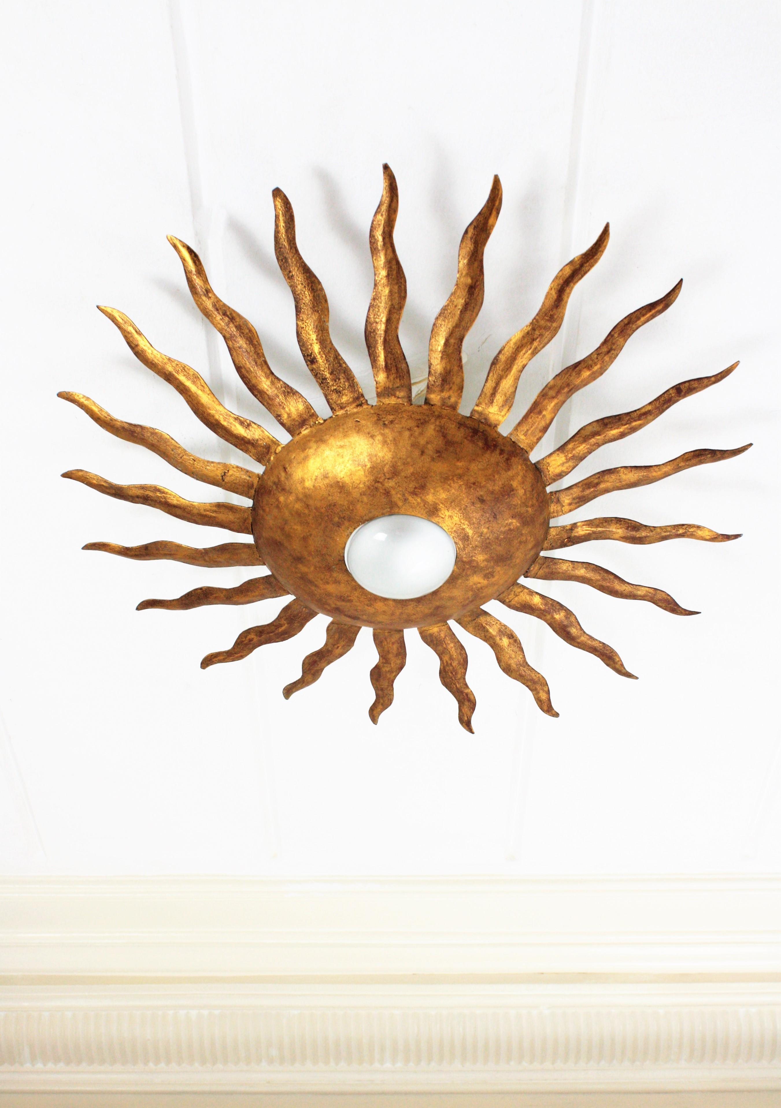 Hammered Spanish Brutalist Sunburst Ceiling Light Fixture in Wrought Gilt Iron