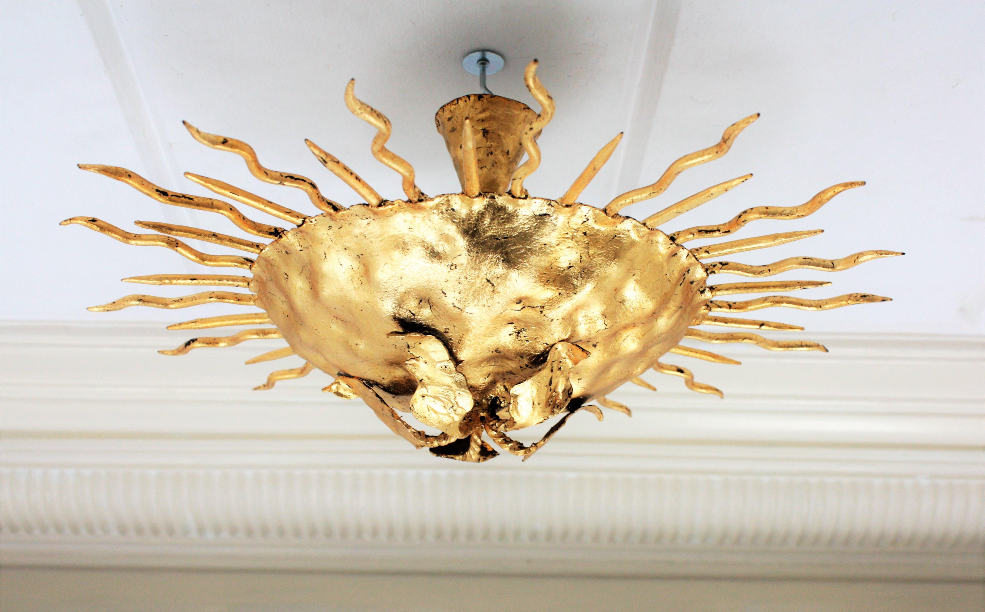 Sunburst Brutalist Light Fixture in Gilt Iron with Flower Motif For Sale 1