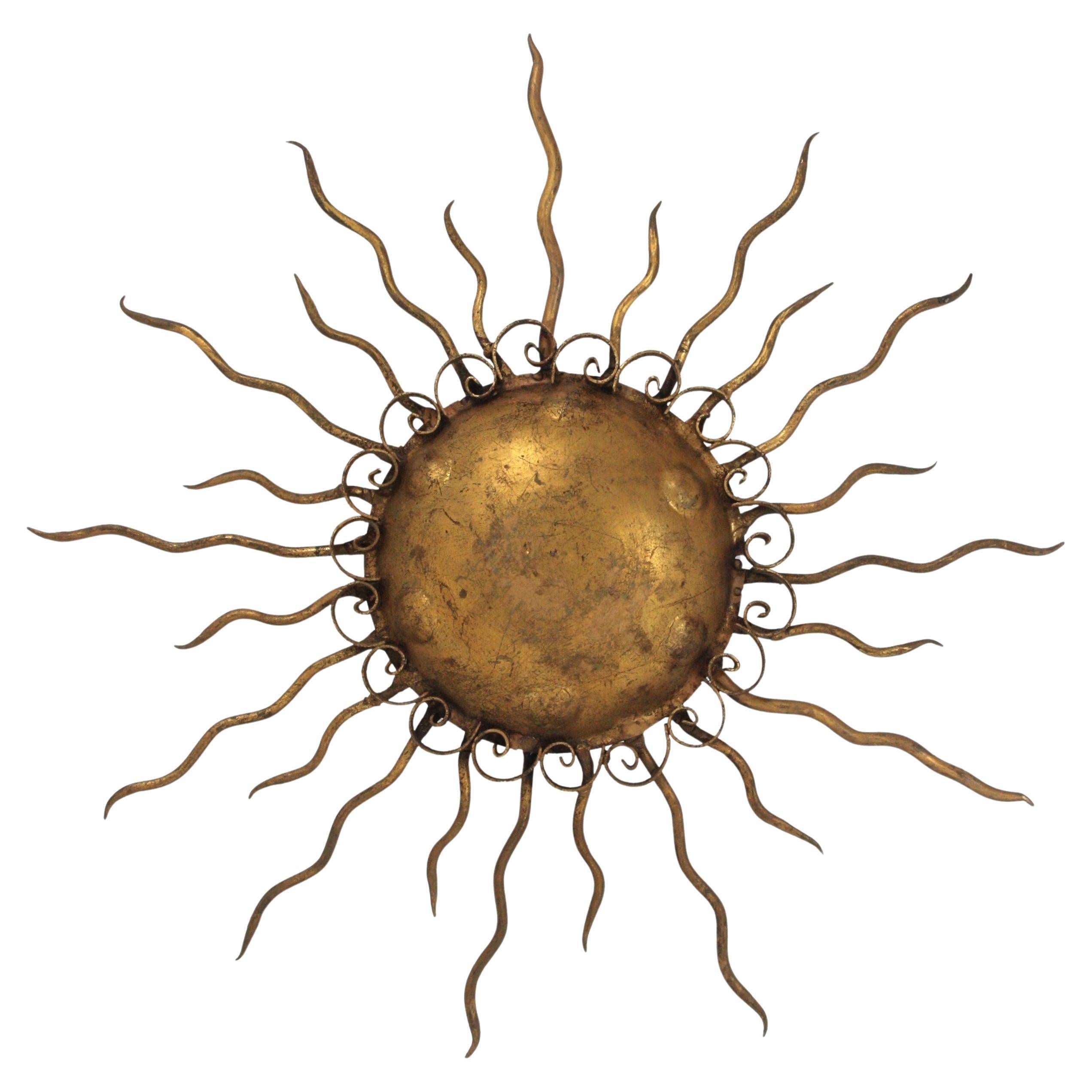 Spanish Brutalist Sunburst Light Fixture in Wrought Gilt Iron, 1950s
