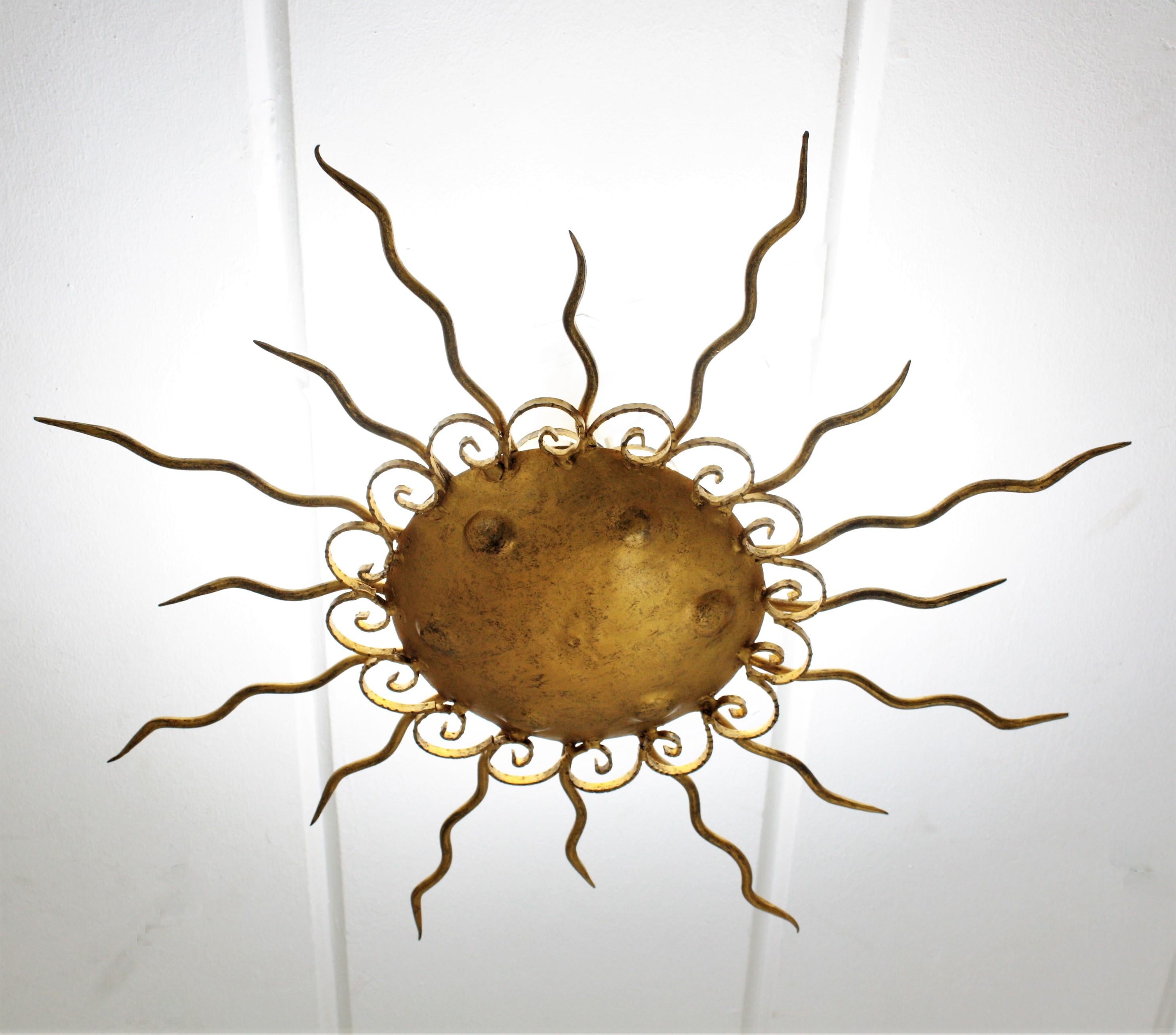 Spanish Brutalist Sunburst Light Fixture in Wrought Gilt Iron For Sale 2