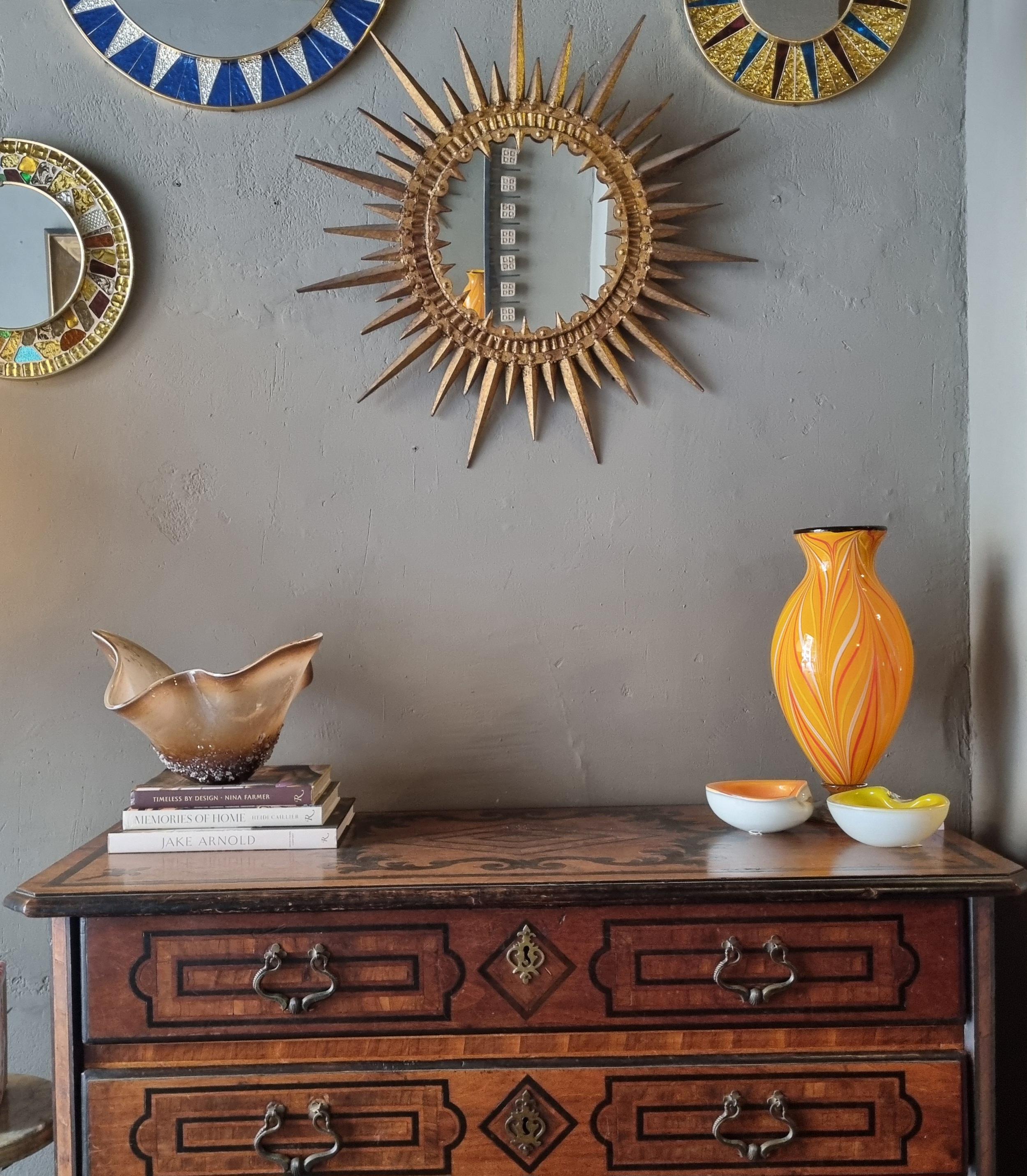 iron spun sunburst mirror