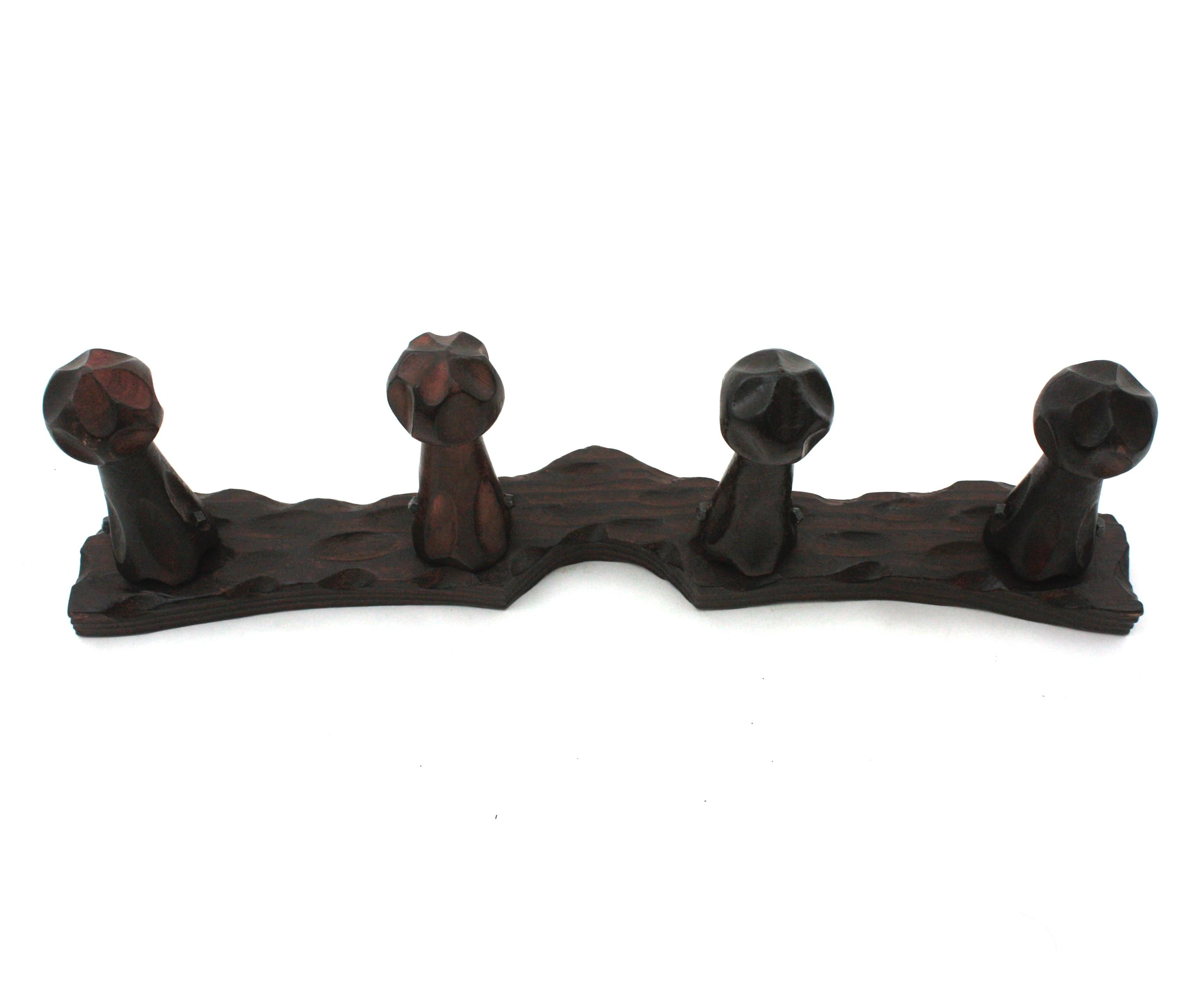 Spanish Colonial Spanish Brutalist Wall Coat Rack  in Carved Wood, Four Hangers For Sale