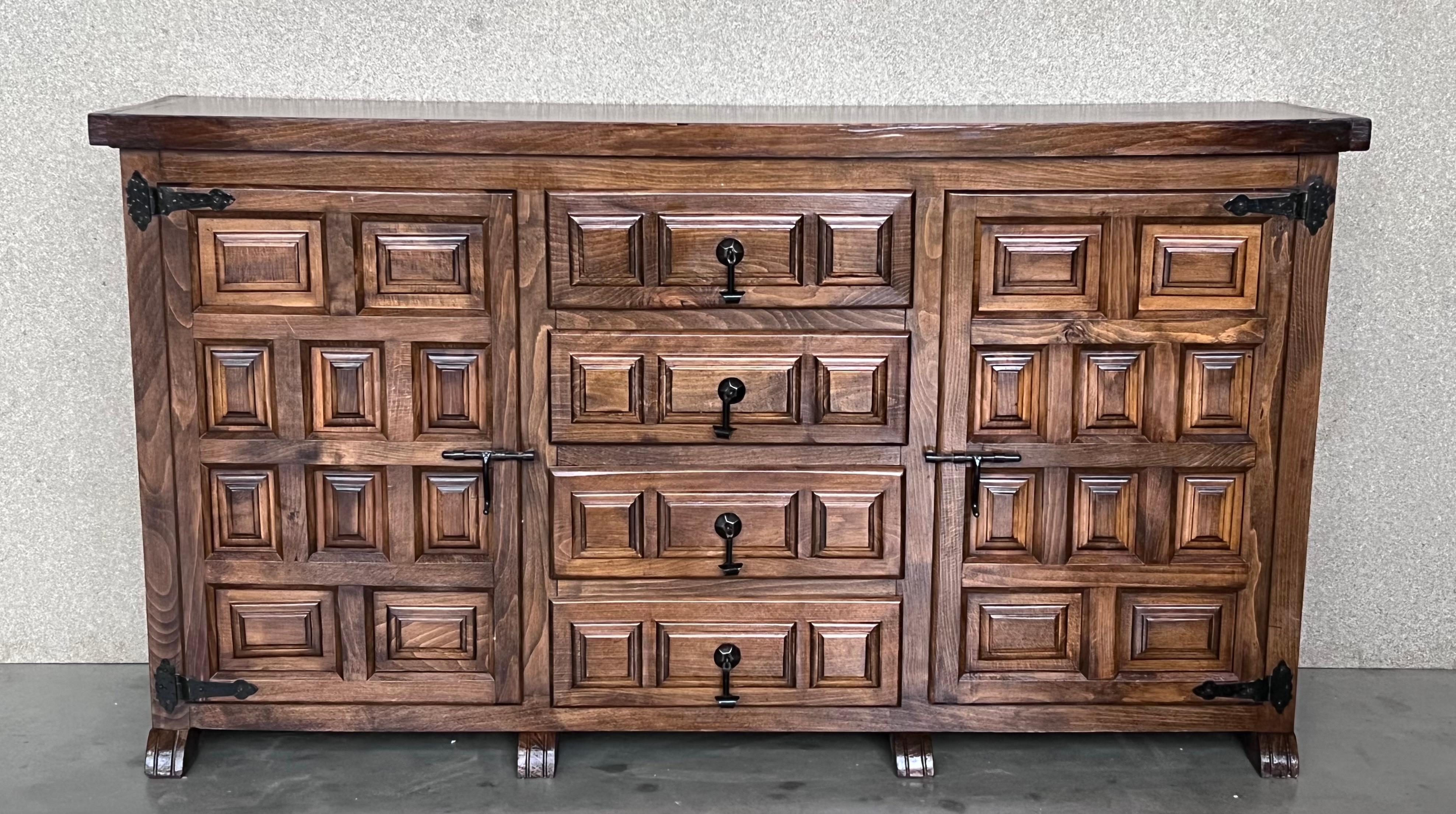 Spanish Buffet with Two Doors and Fours Drawers with original hardware and paneled carved typical of this region and period.


 
