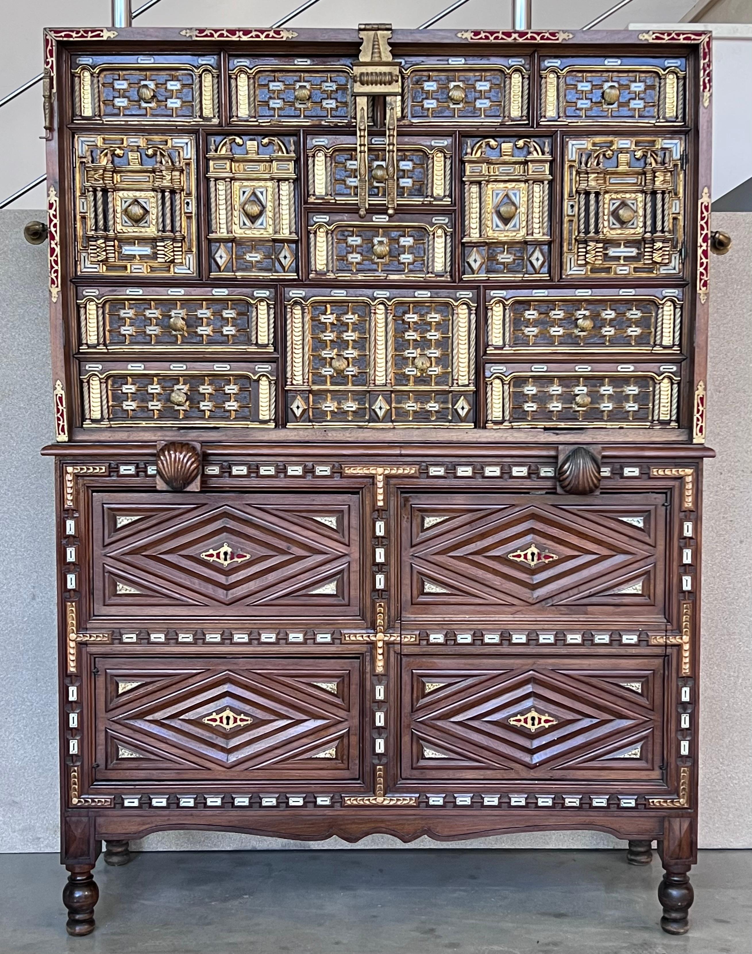 The rectangular locker rests on chest with legs, and has four drawers decorated with diamonds that lock and fittings and shield shown horseshoe. Answer a type called 