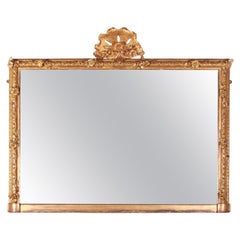 Miroir surmonté d'un manteau sculpté espagnol