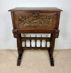 Spanish Carved Wood Bargueño with Figural Decoration