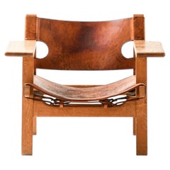 Silla española de cuero y roble de Børge Mogensen, década de los 50