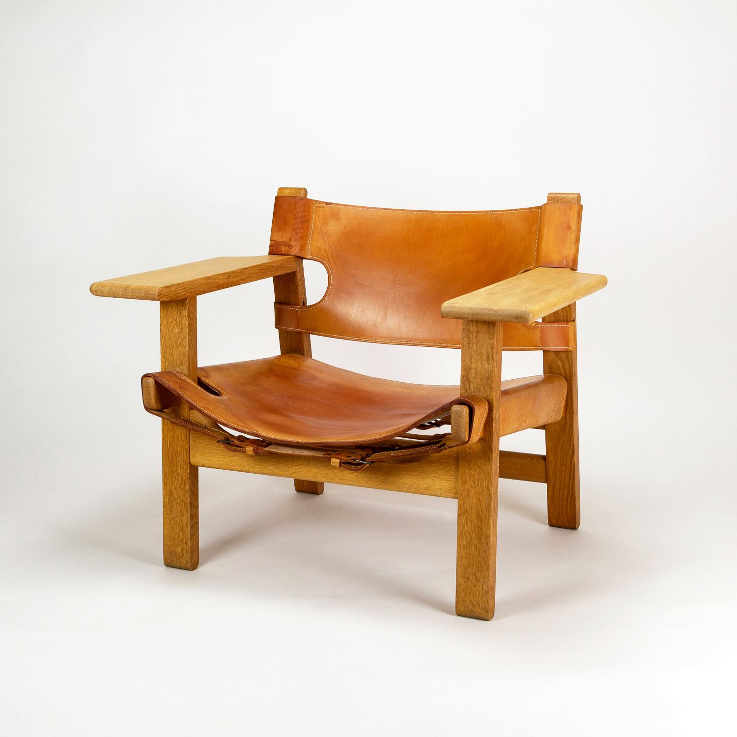 The iconic Spanish chair, model BM2226 by Børge Mogensen in cognac leather and solid oak. Designed in 1958. Fredericia, Denmark, 1960s. The oak has been soap treated and the leather conditioned.