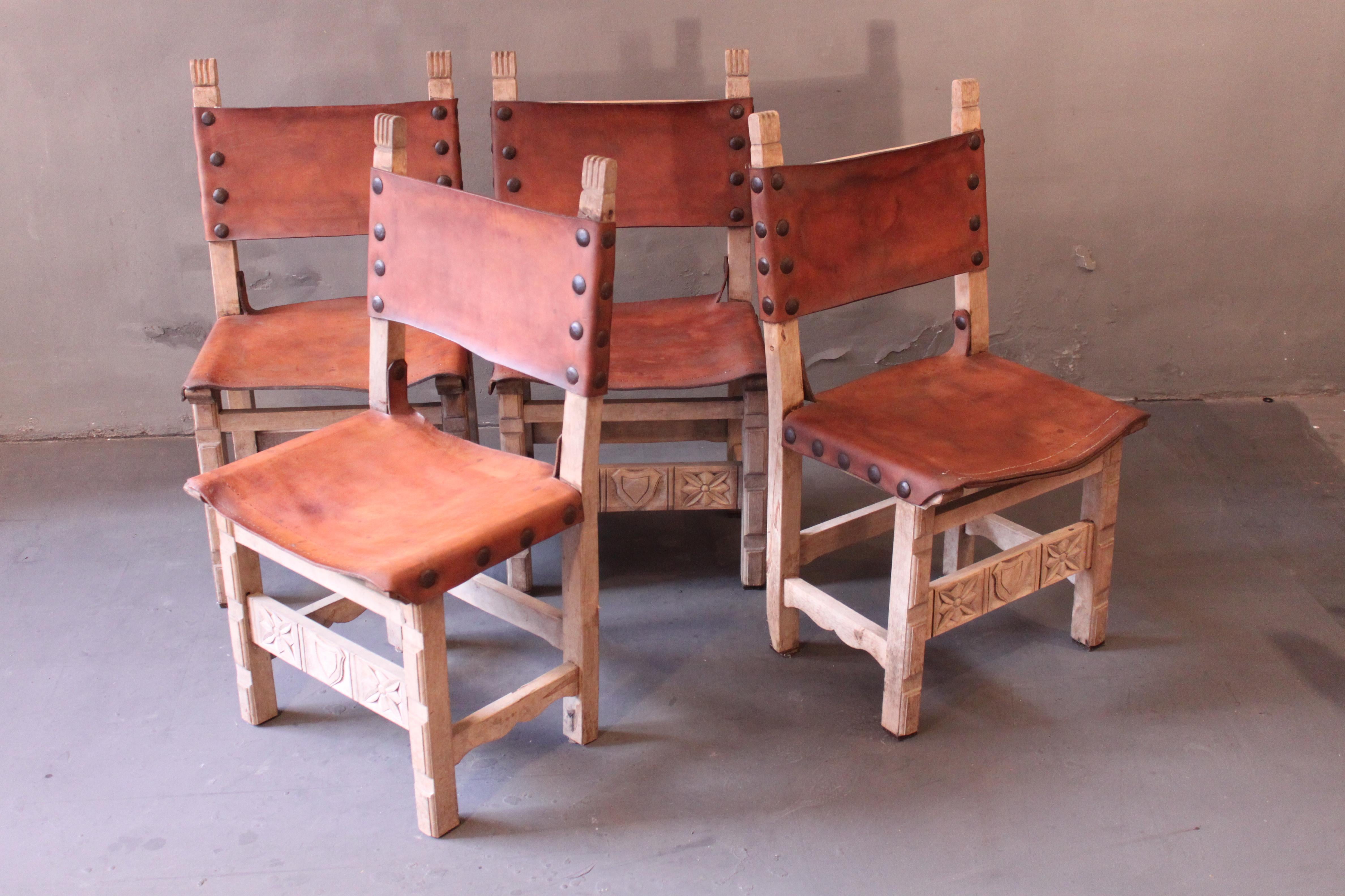 Typical Spanish chairs from circa 1930, Handcrafted, Designer unknown. Leather seat and backrest. Simple ornaments of beauty.