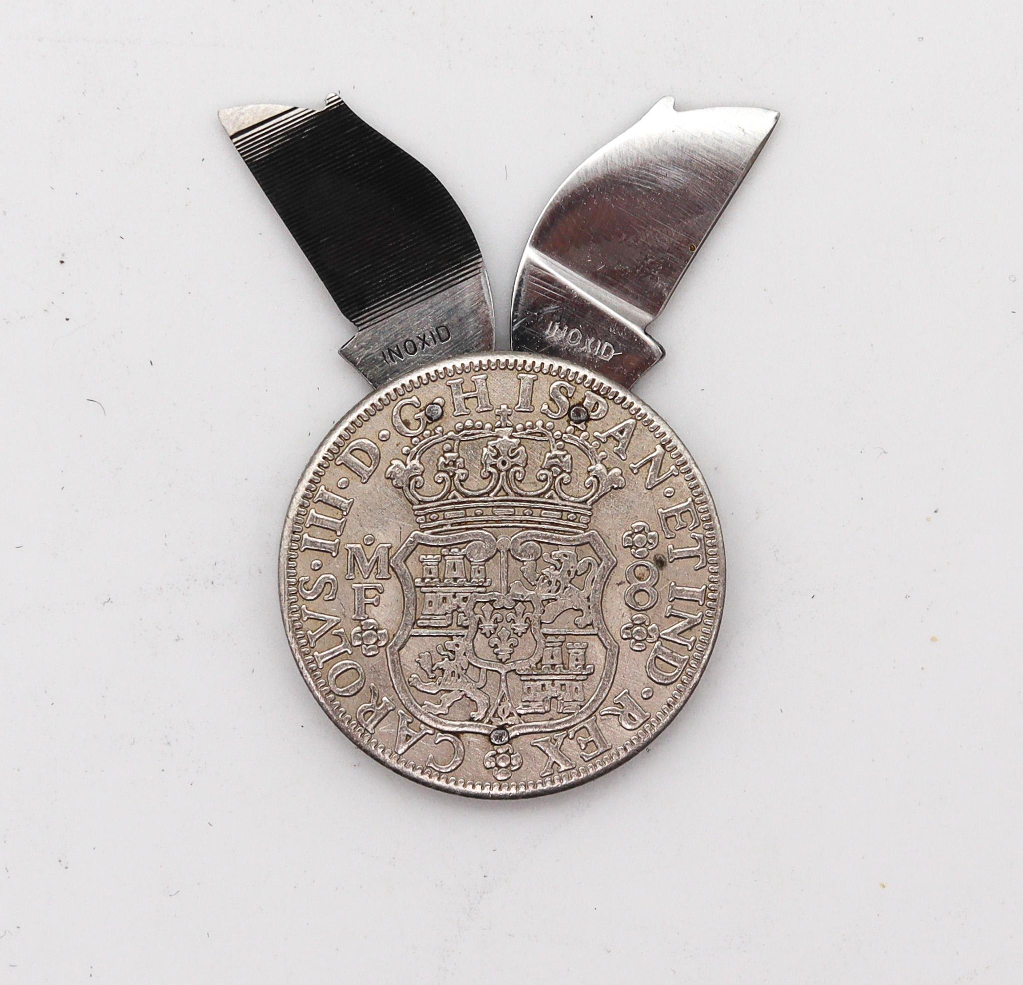Ein Taschenmesser mit einer spanischen Münze.

Schöne antike Taschenmesser, in Spanien erstellt, zurück in den 1930er Jahren. Dieses Taschenmesser ist sehr ungewöhnlich, da es mit einer spanischen Münze und massivem Solinger Stahl gefertigt wurde.