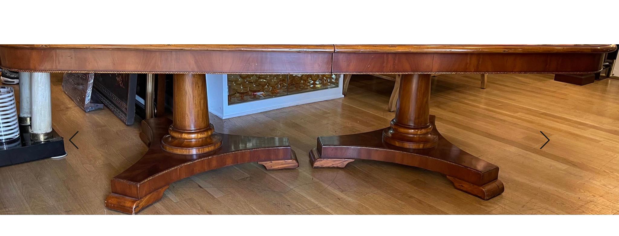 Spanish Colonial 18th C style Alfonso Marina Ebanista dining table
Includes two leaves each measuring 24” wide.