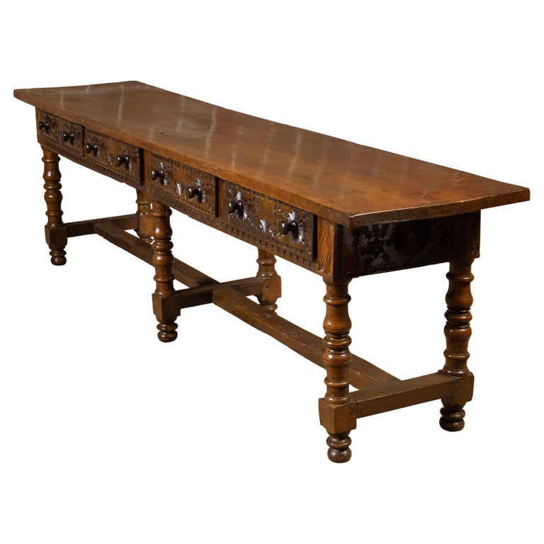 Spanish Colonial 18th Century Walnut Table with Four Richly Carved Drawers For Sale
