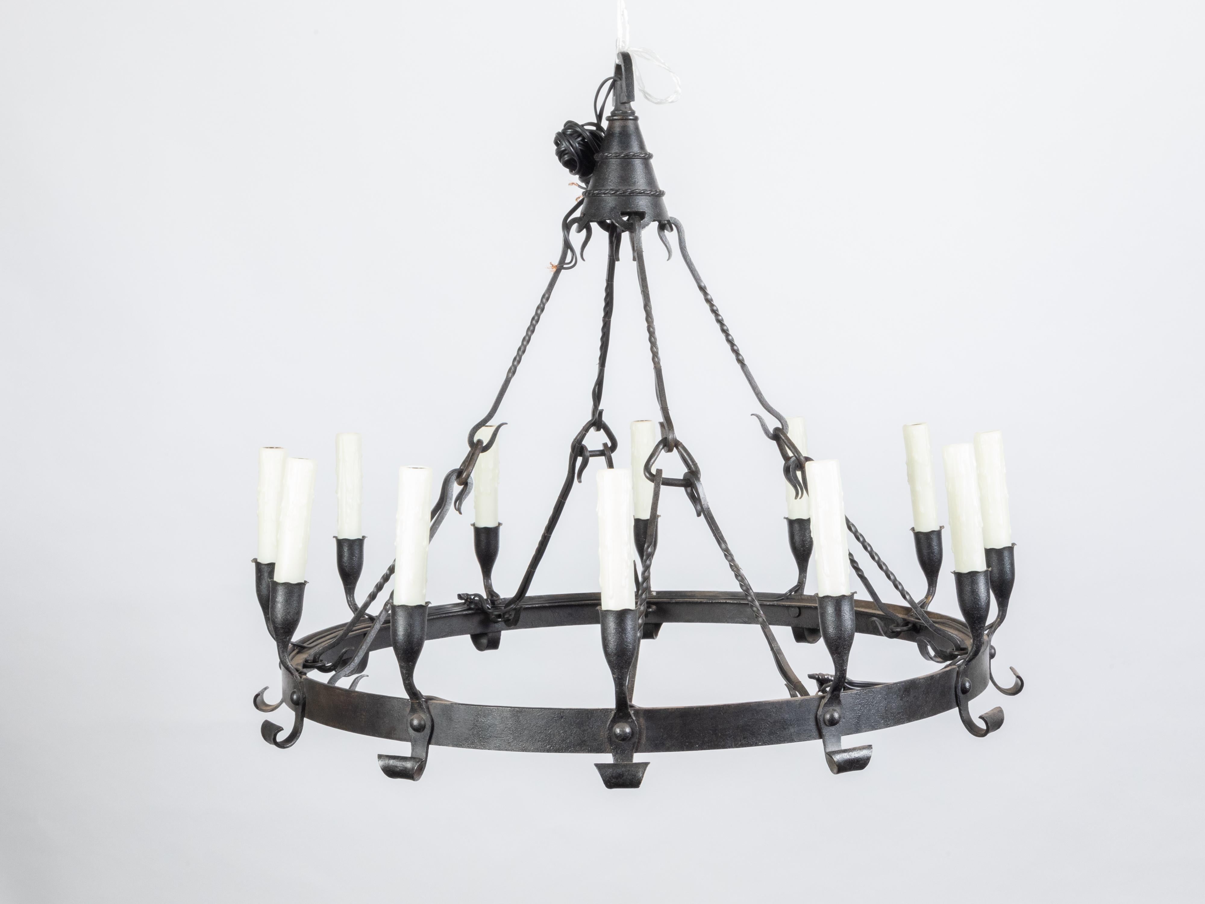 20th Century Spanish Colonial 1900s 12-Light Iron Chandelier with Ring and Dark Patina For Sale