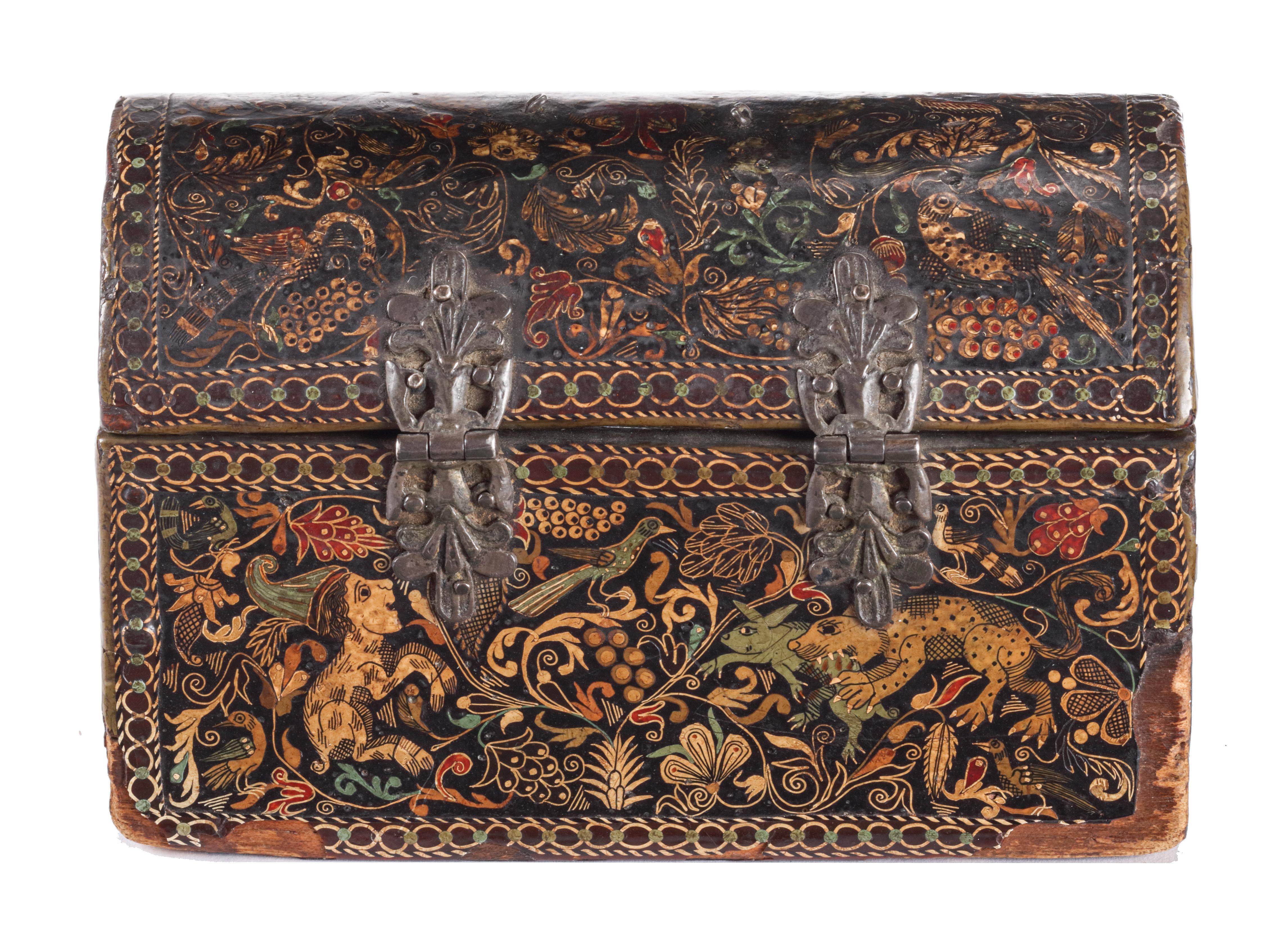 An important Spanish colonial Barniz de pasto lacquer casket with the Jesuit IHS monogram and silver mounts
 
Colombia, 1625-1650

L. 13.3 x W. 6.9 x H. 8.4 cm

The surface of the casket has been richly decorated in colourful barniz de pasto