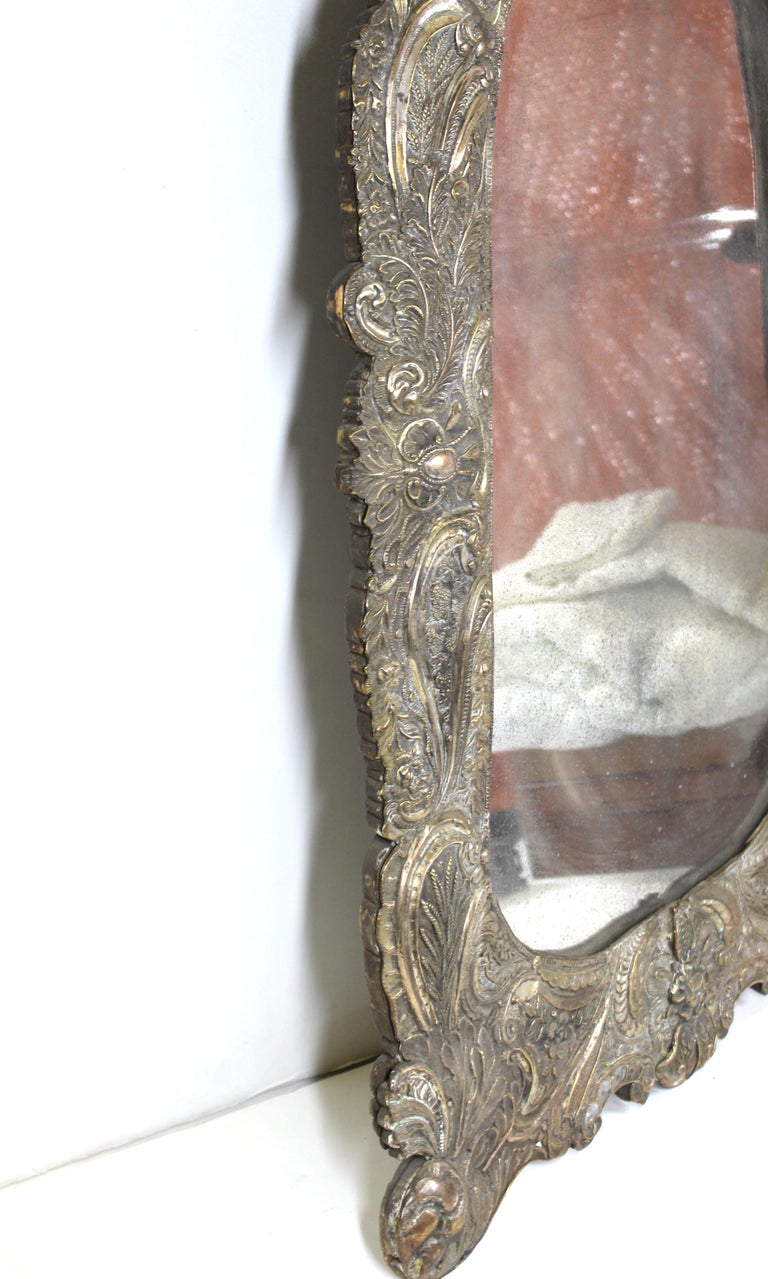 Spanish Colonial Baroque Repoussé Silver Ornate Mirror Frame For Sale