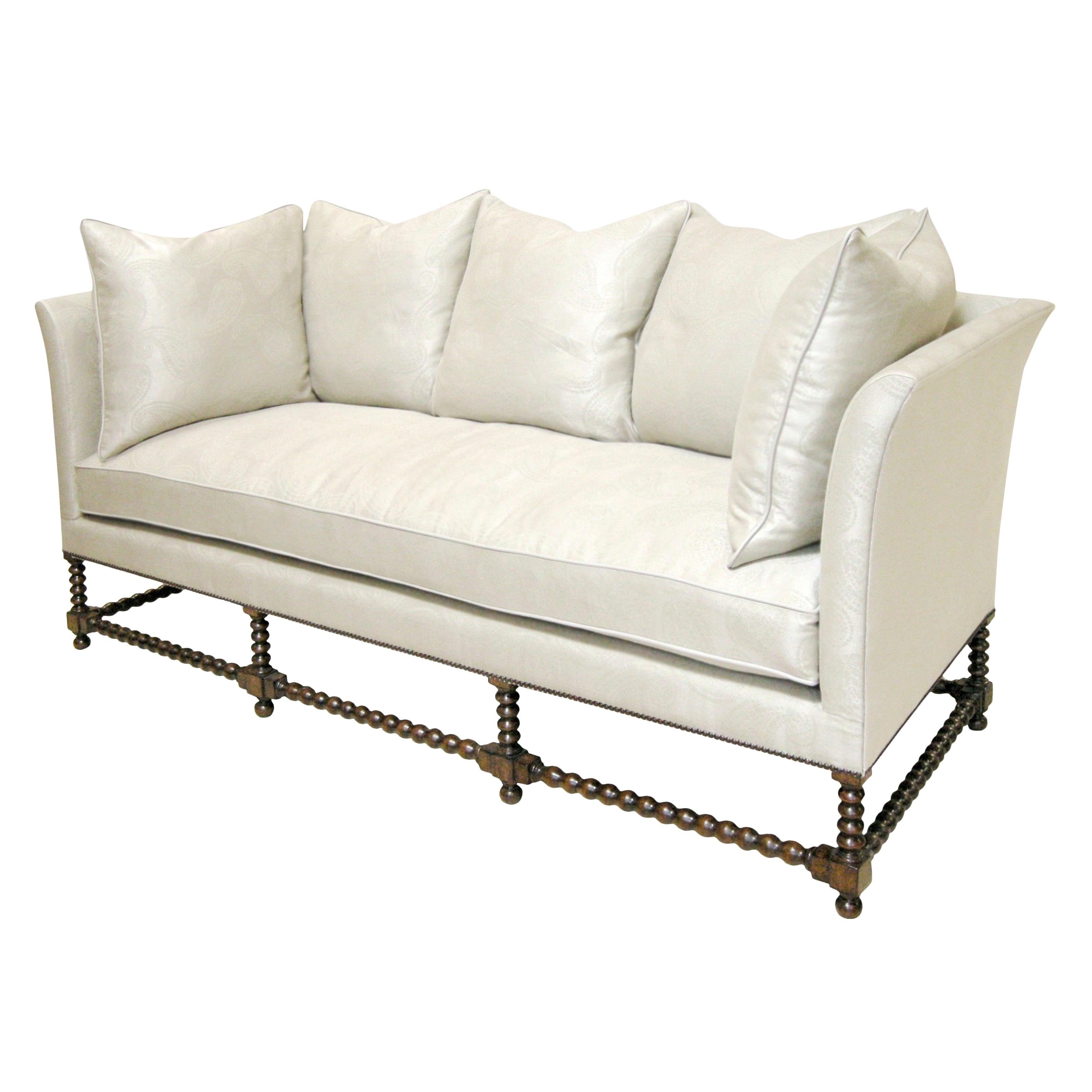 Spectacular designer sofa by Randy Esada designs for Prospr.

Made to order.

Item #: 9028 - Torino sofa
Finish: Distressed medium walnut
C.O.M./C.O.L.: C.O.M. = 20 Yards Plain - Railroaded & Self-Trim
C.O.L. = 230 square feet - approx. 5