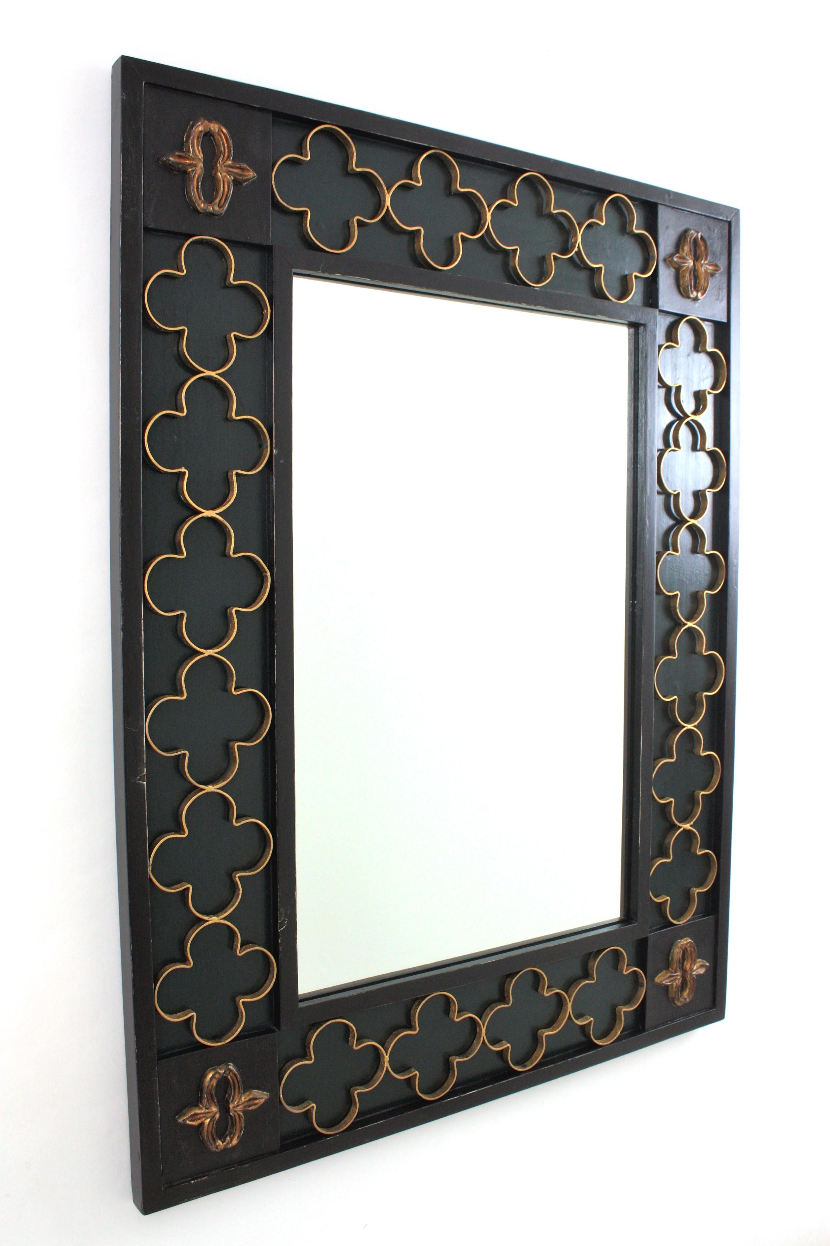 Mid-Century Modern Spanish Colonial Green Black Rectangular Mirror with Gilt Iron Rosettes, 1950s For Sale