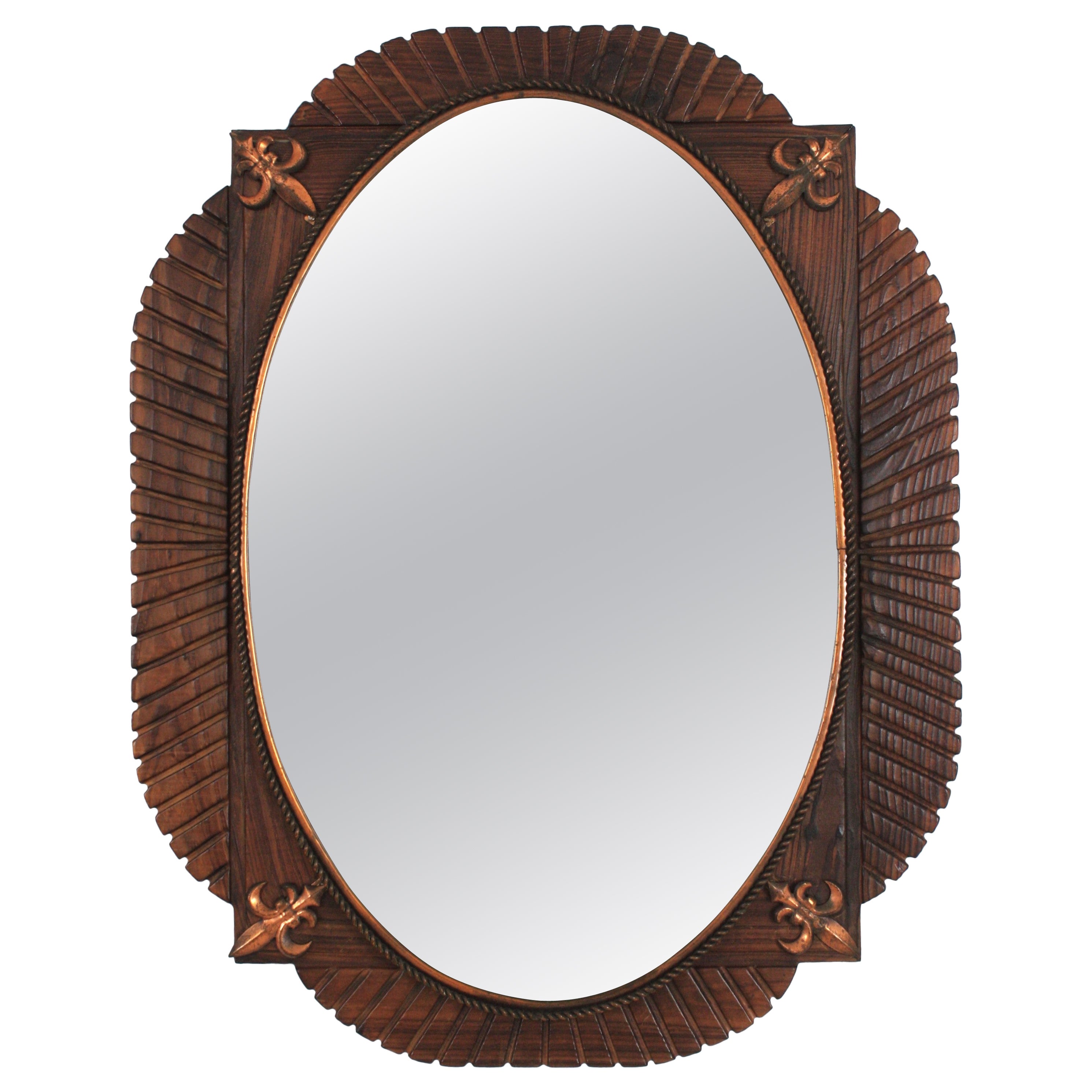 Spanish Colonial Oval Mirror in Carved Wood 
Copper Fleur de Lys Accents