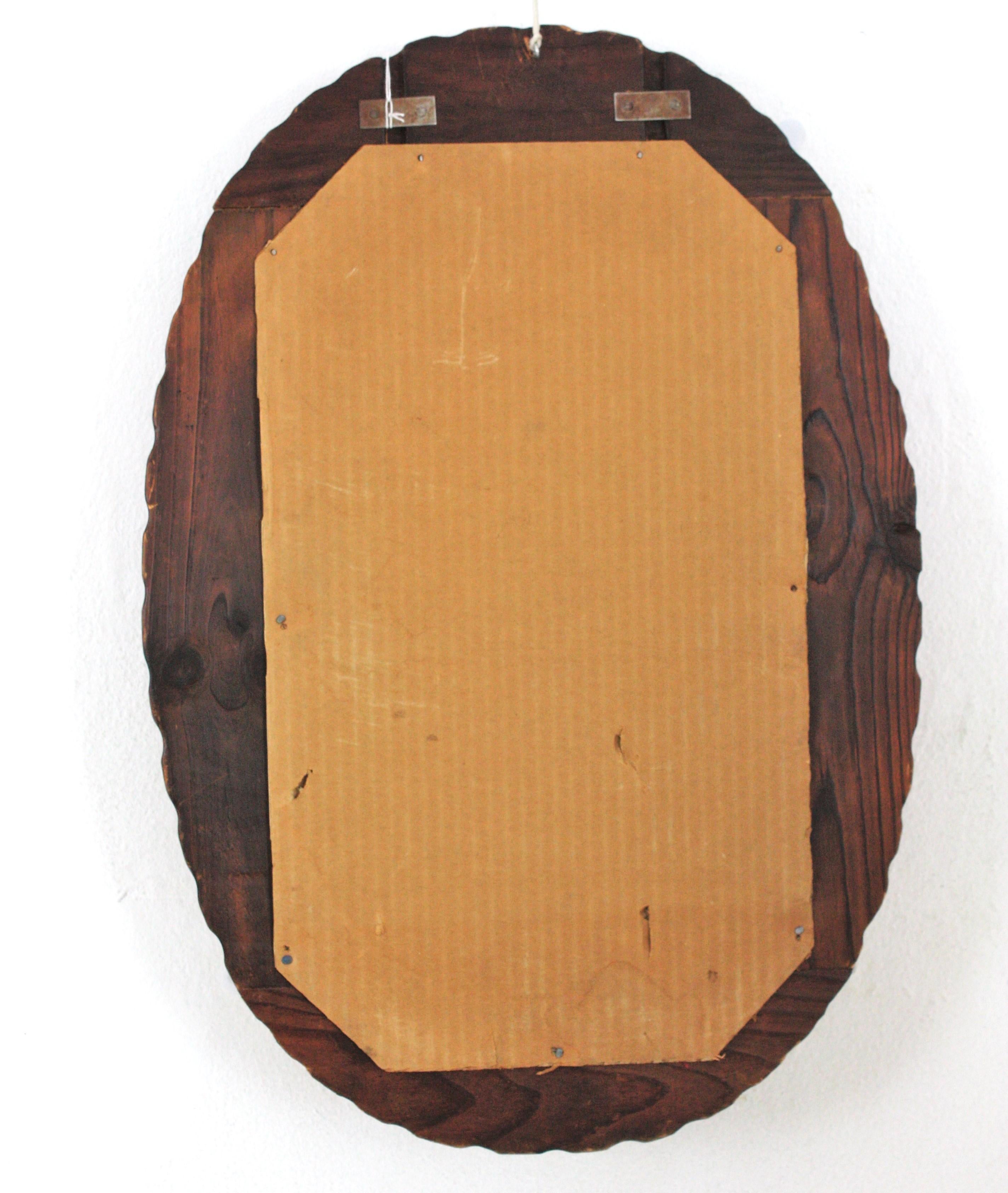 Spanish Colonial Oval Mirror in Carved Wood with Copper Metal Flowers For Sale 6