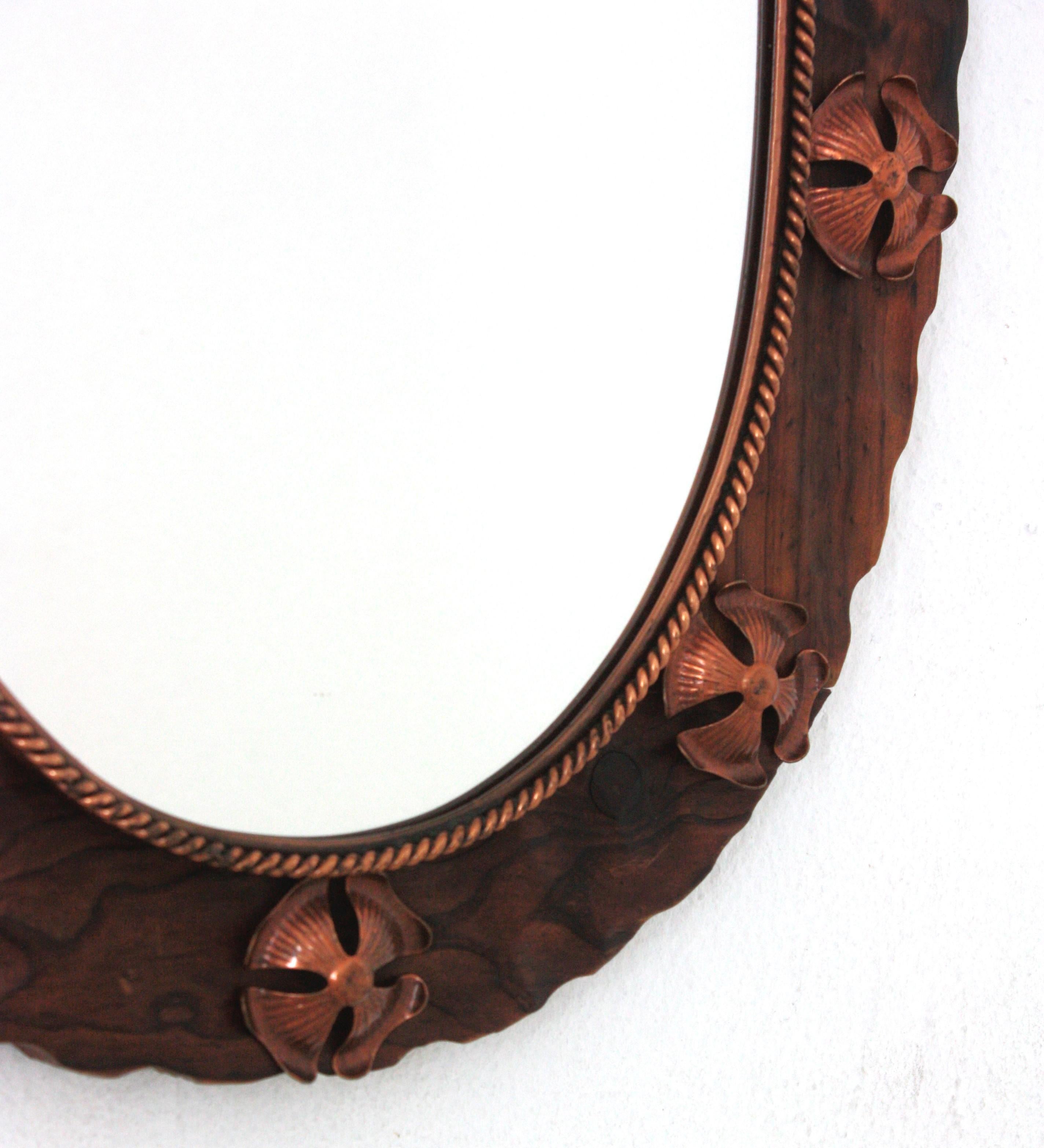 Spanish Colonial Oval Mirror in Carved Wood with Copper Metal Flowers For Sale 1