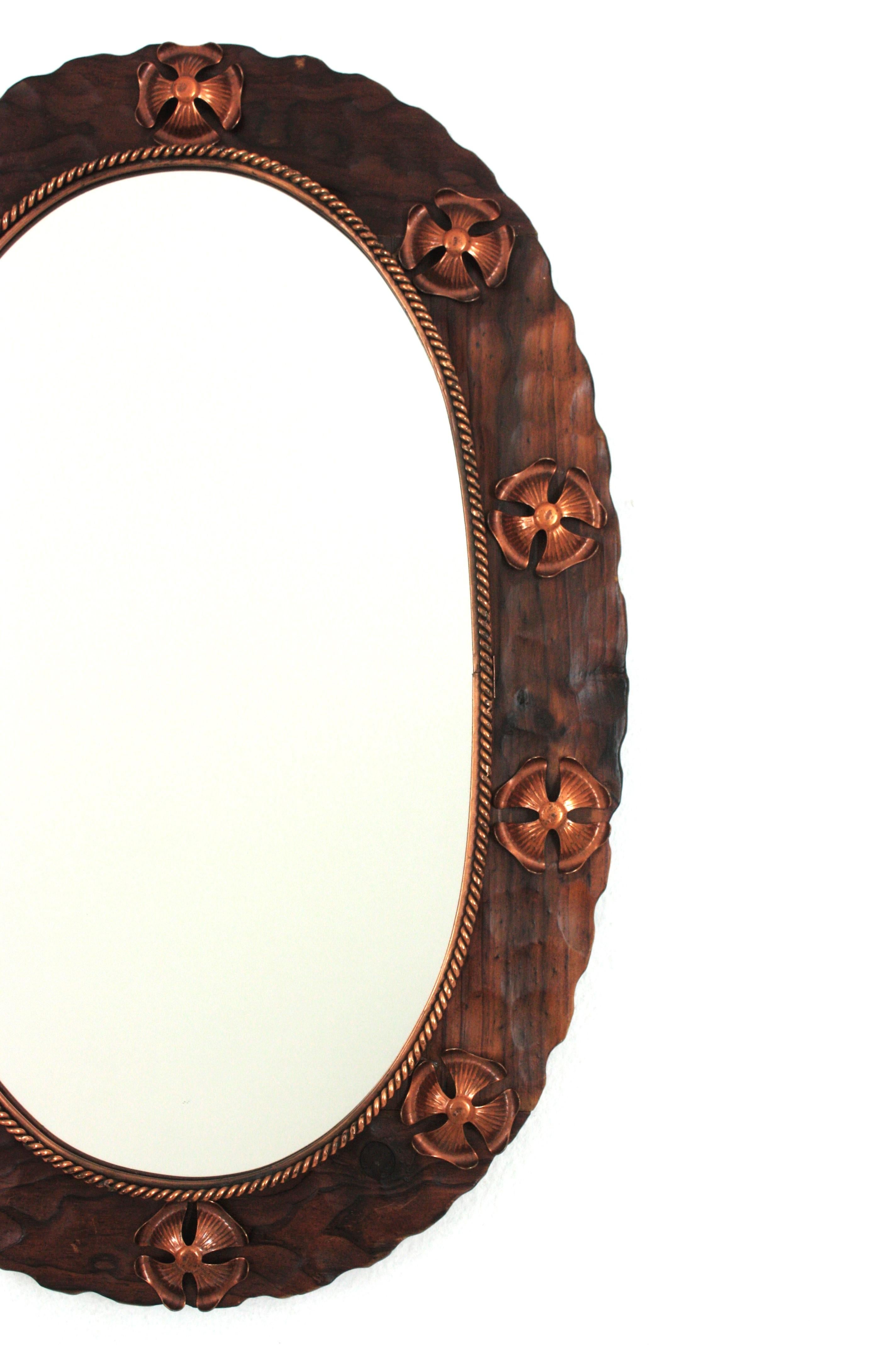 Spanish Colonial Oval Mirror in Carved Wood with Copper Metal Flowers For Sale 3