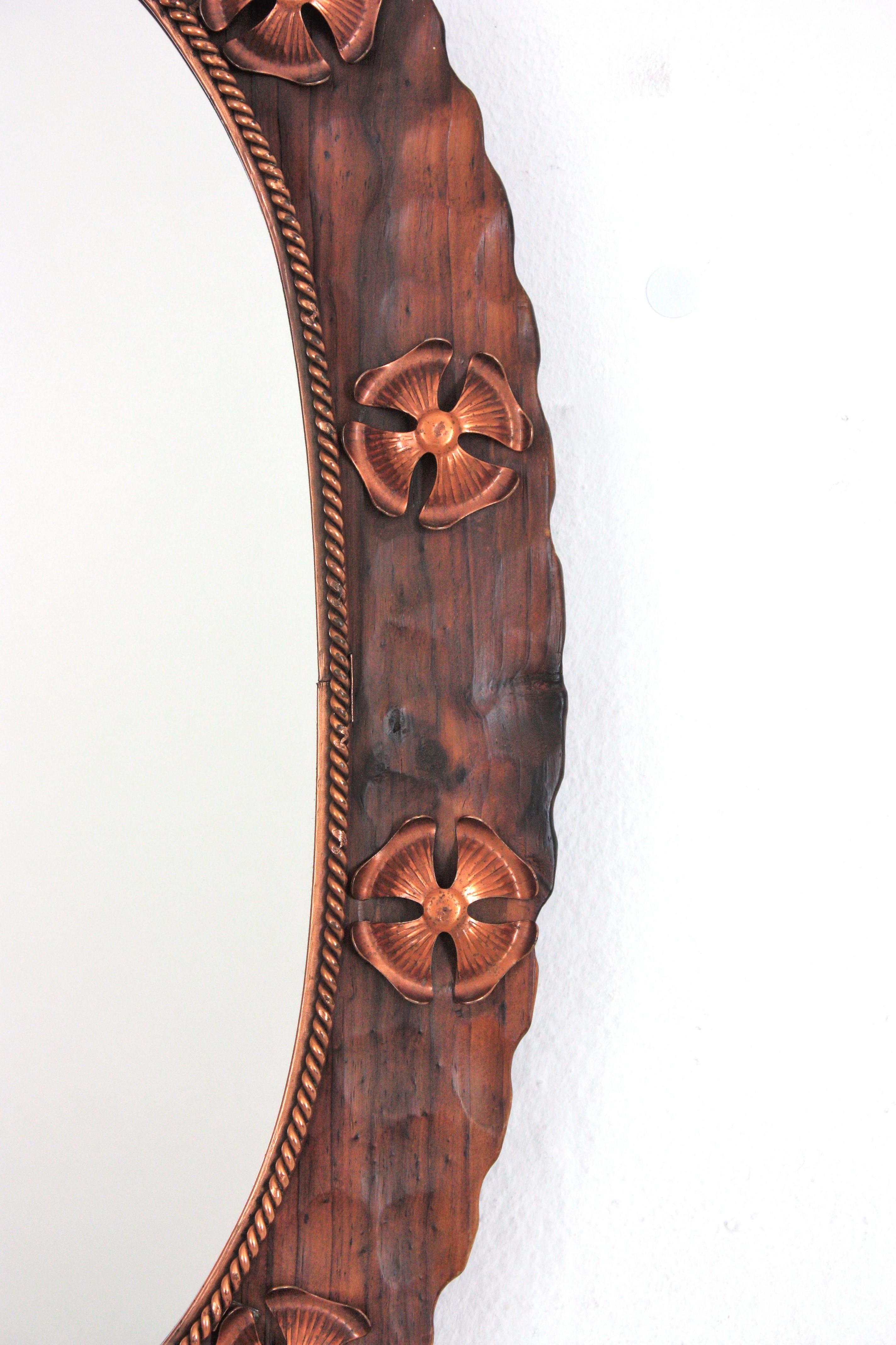 Spanish Colonial Oval Mirror in Carved Wood with Copper Metal Flowers For Sale 4