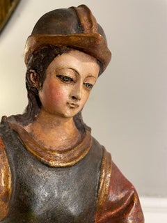 Spanish Colonial Painted and Gilt Santos of Saint Michael the Archangel