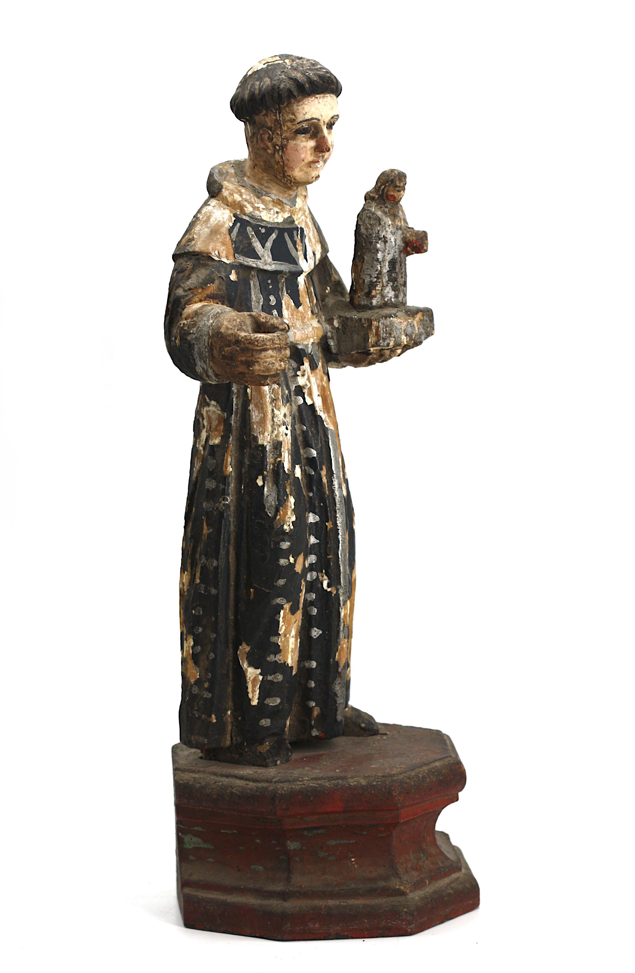 
Coloni spagnoli dipinti di Sant'Antonio.
La figura in legno dipinto tiene in una mano dei libri e un bambino, su una base ottagonale dipinta.
Altezza 15,5 pollici, Larghezza alla base 5,5 pollici, Profondità 5,5 pollici.
Rapporto sulle