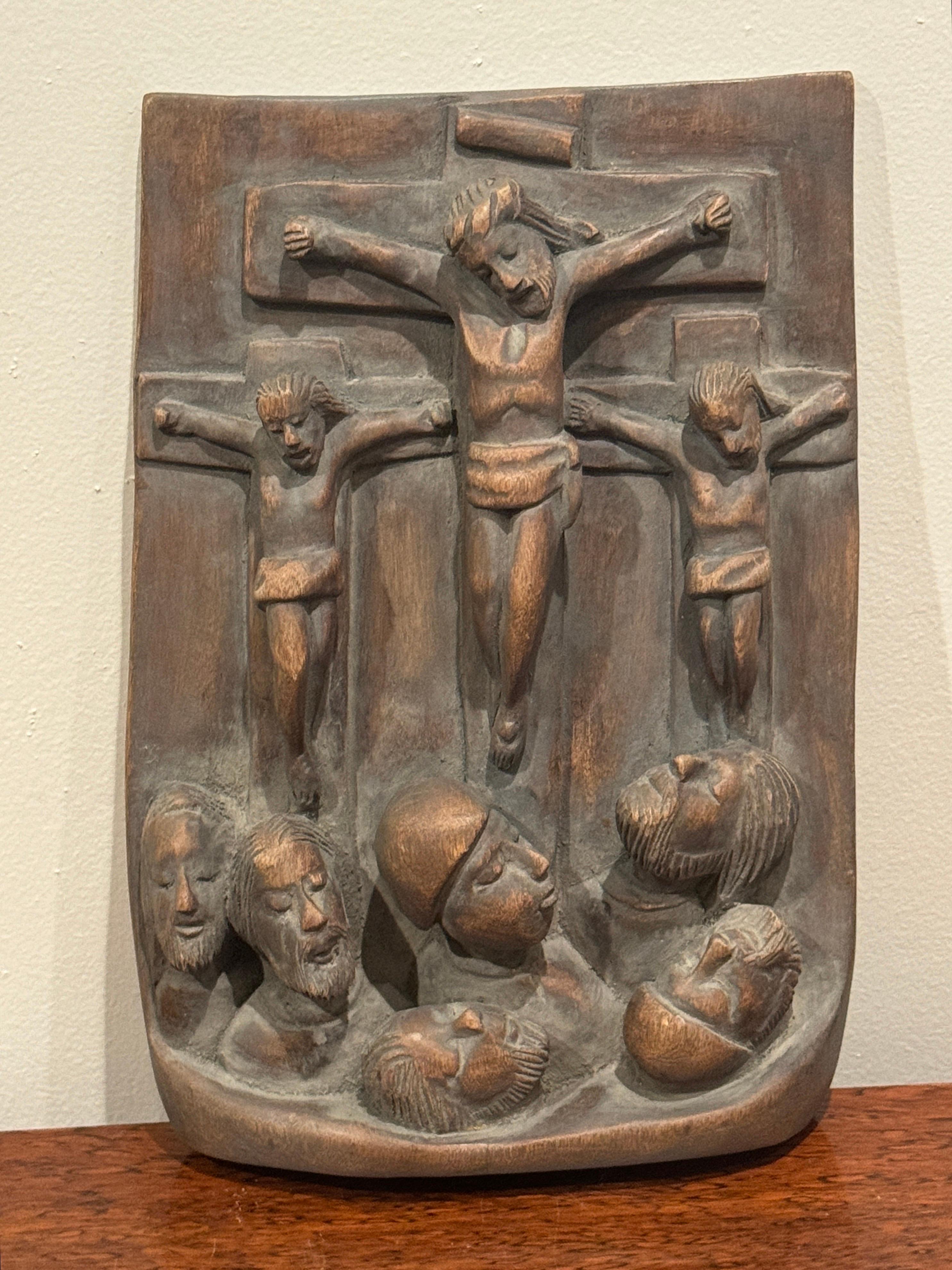 Spanish Colonial Religious Wood Carving Icon, Christ Crucified with Two Thieves, Late 19th Century 

This late 19th-century Spanish Colonial religious wood carving icon is a finely crafted relief depicting the crucifixion of Christ alongside the two