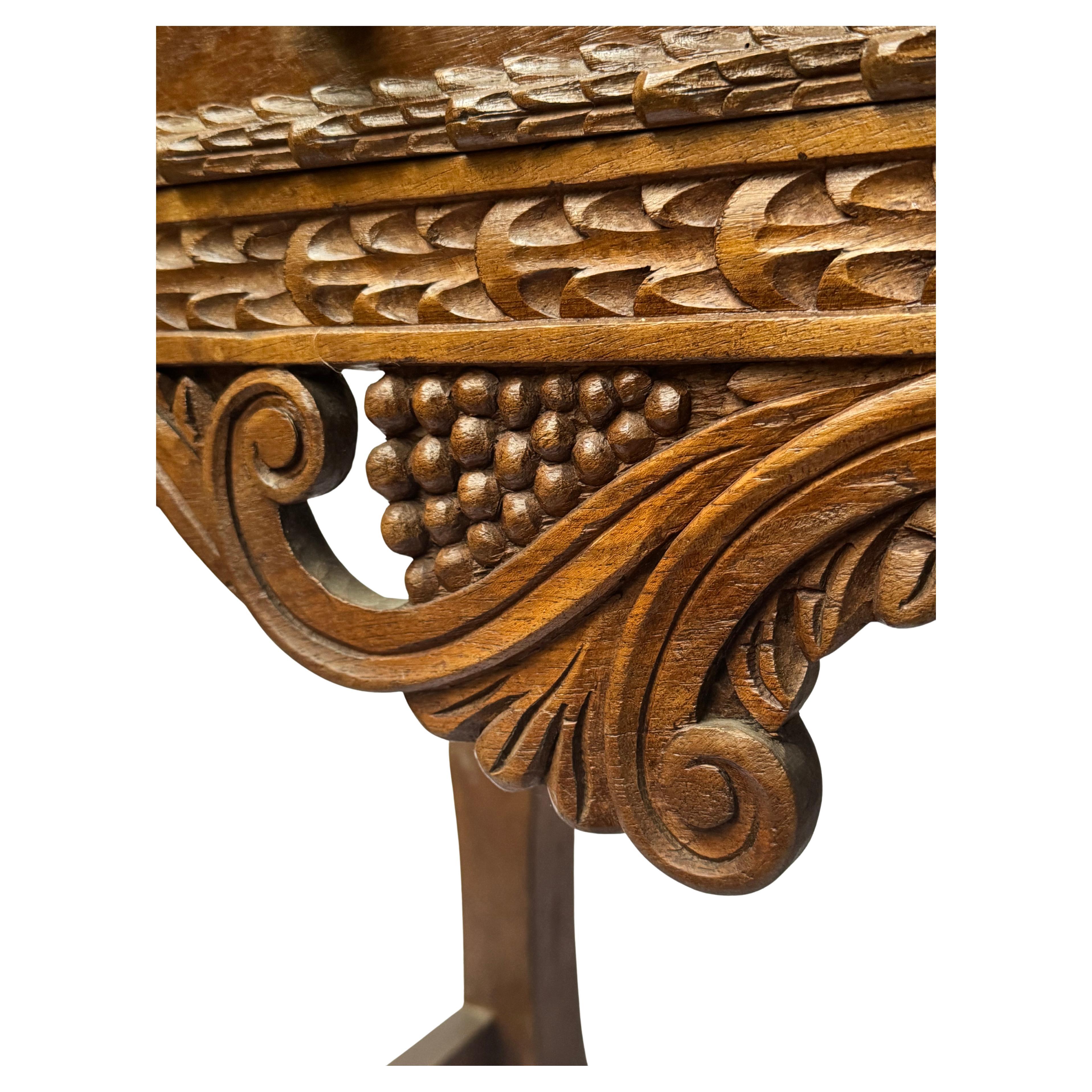 Spanish Colonial Revival Console Table – Circa 1940
A splendid testament to the refined craftsmanship of the Spanish Colonial Revival movement, this circa 1940 console table combines sculptural artistry with robust elegance. Measuring 119.5 cm in