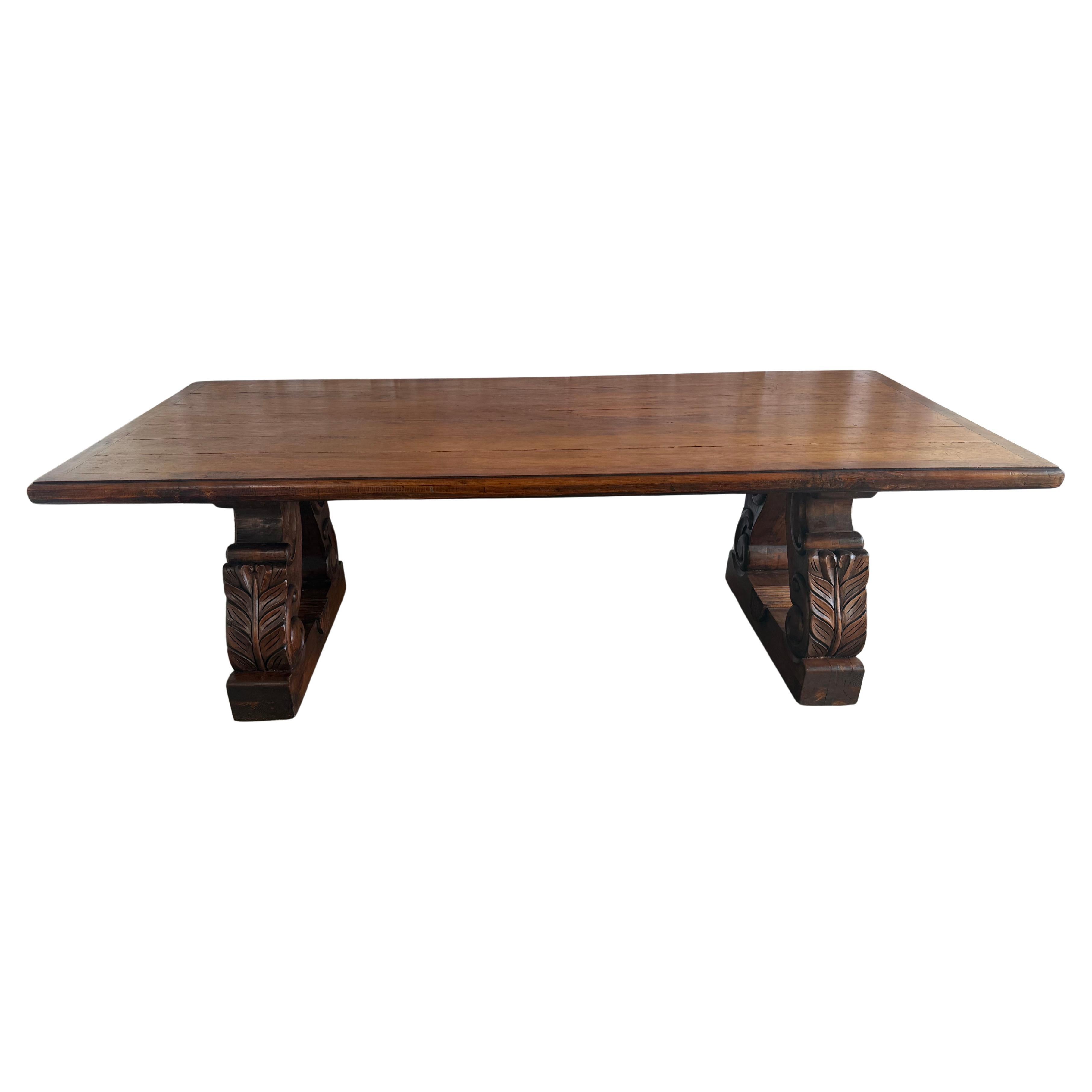 Spanish Colonial Revival Walnut Dining Table with Hand-Carved Scroll