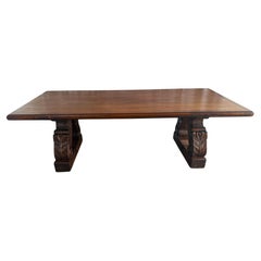 Spanish Colonial Revival Walnut Dining Table with Hand-Carved Scroll