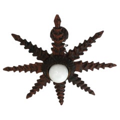 Spanish Colonial Starburst Pendant Light Fixture in Carved Wood, 1940s