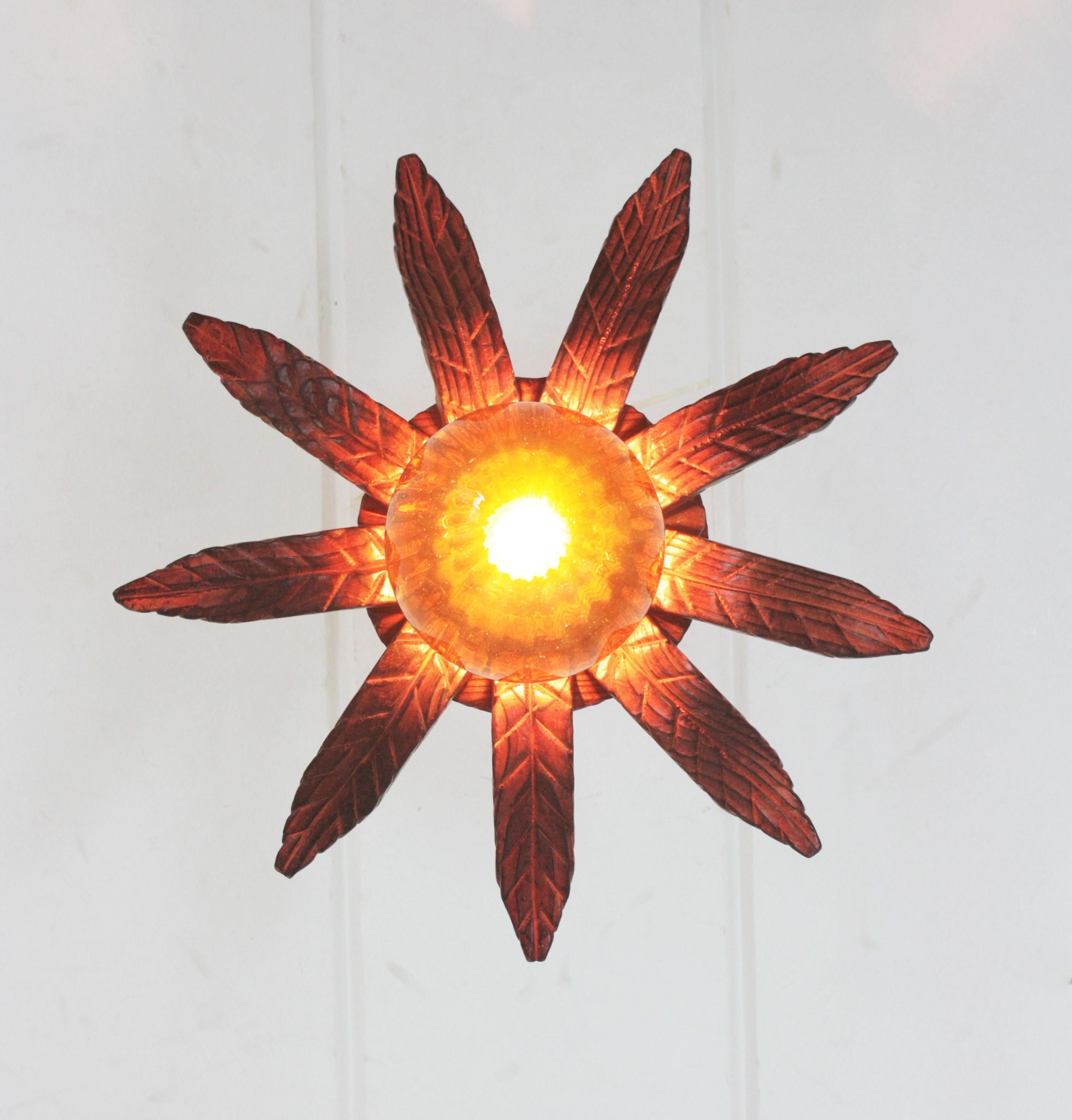 Spanish Colonial Sunburst Light Fixture in Carved Wood with Amber Glass Globe For Sale 7