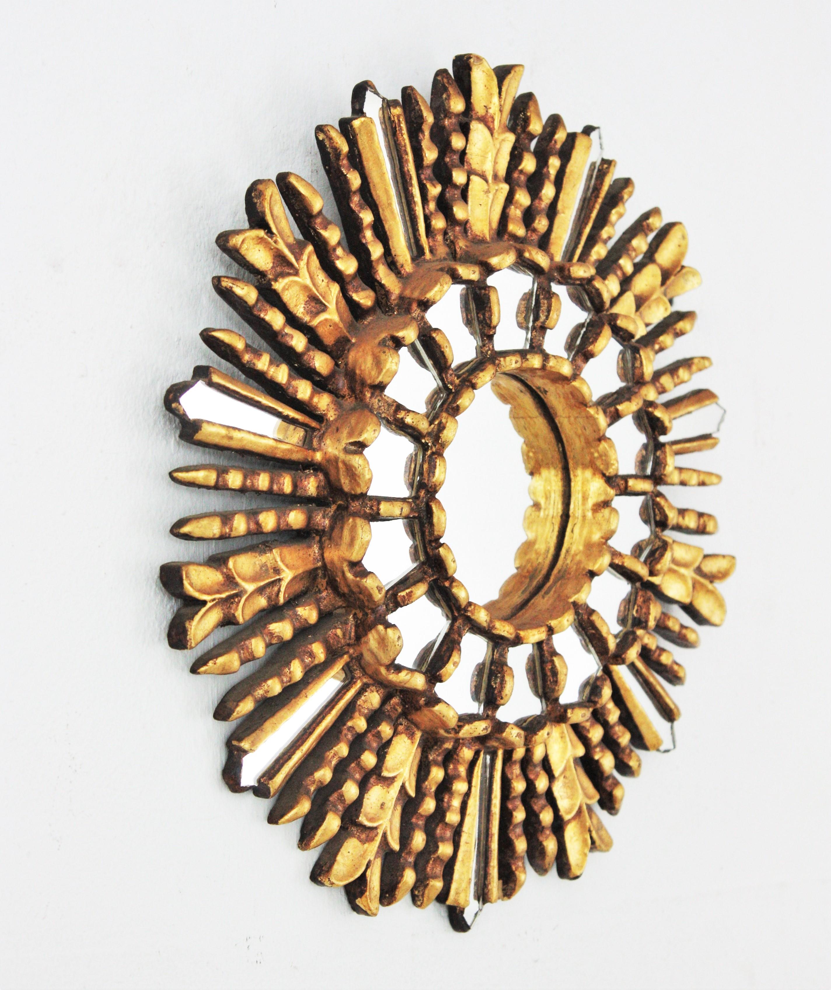 Spanish Sunburst Mirror in Giltwood with Mirror Insets, 1950s For Sale