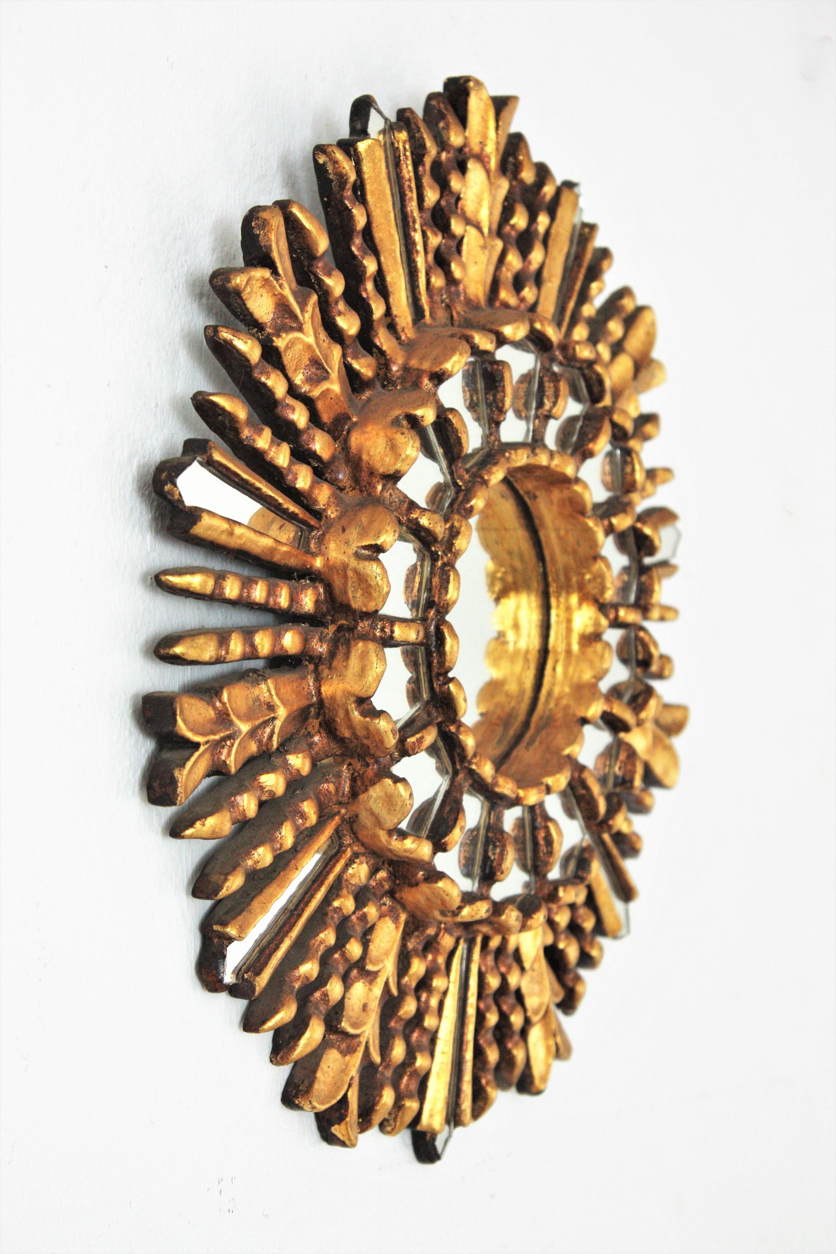 Hand-Crafted Sunburst Mirror in Giltwood with Mirror Insets, 1950s For Sale
