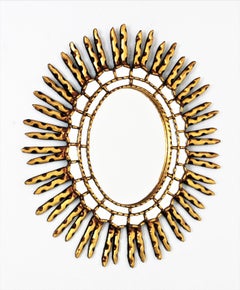 Oval Sunburst Mirror in Giltwood with Mirror Insets, Spanish Colonial, 1950s