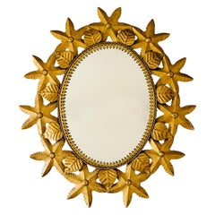 Spanish Colonial Sunburst Style Gilt Floral Oval Mirror