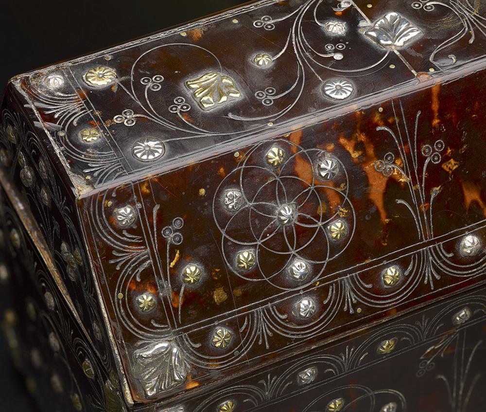 An extremely rare Spanish colonial tortoiseshell casket; late 16th-early 17th century; measures: approximate 8 1/2 inches wide, 5 inches tall and 3 1/2 inches deep. The casket is intricately decorated all-over with floral motifs and highlighted with