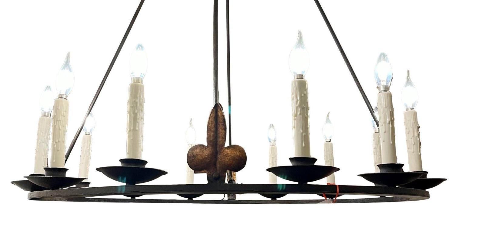 Spanish Colonial Wrought Iron 12 Lite Chandelier by Randy Esada for Prospr In Good Condition In LOS ANGELES, CA