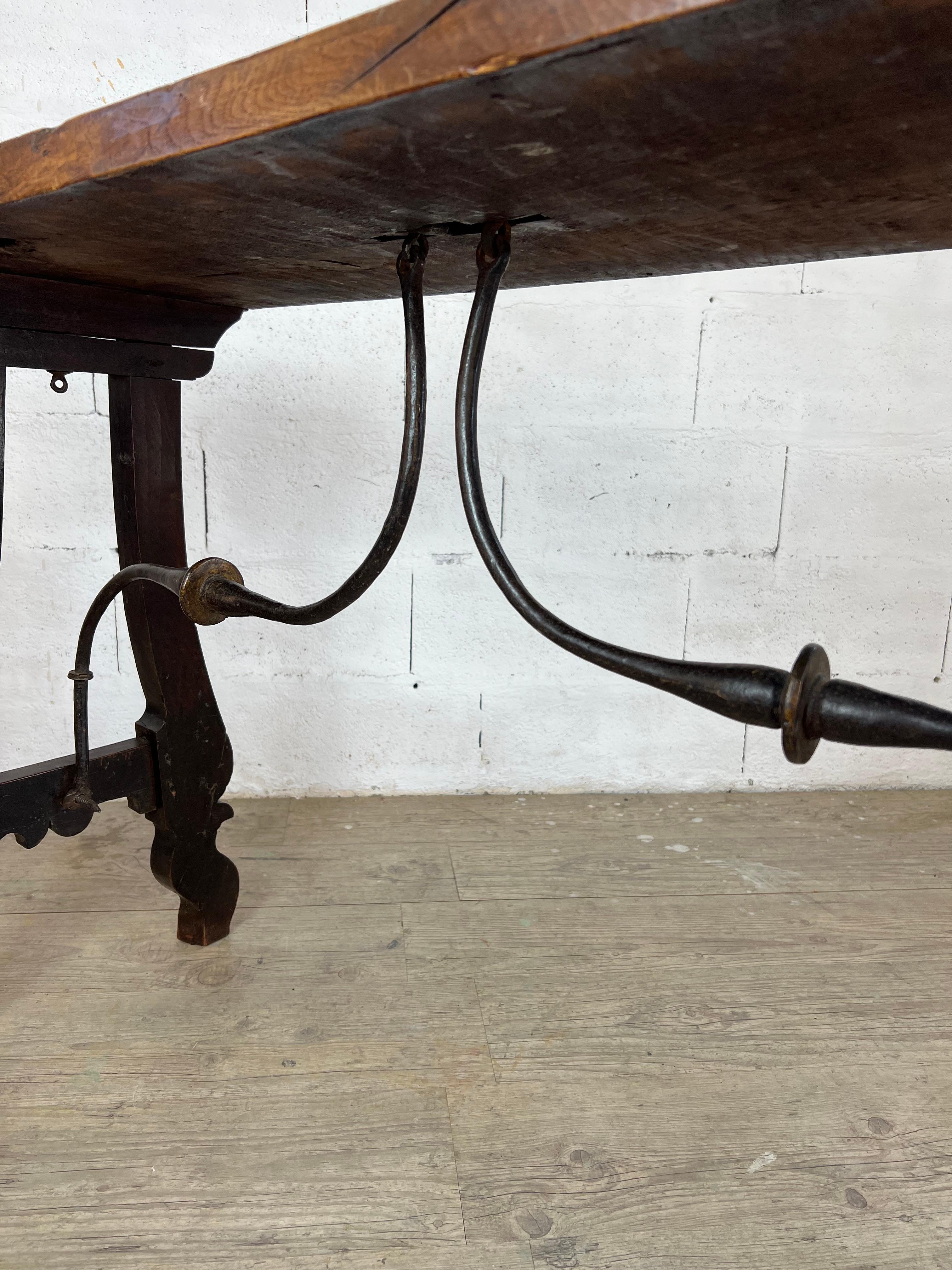 Hand-Carved Spanish console in massive walnut waxed and iron legs late XVIIth For Sale