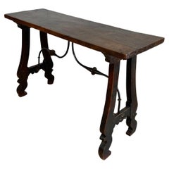 Antique Spanish console in massive walnut waxed and iron legs late XVIIth