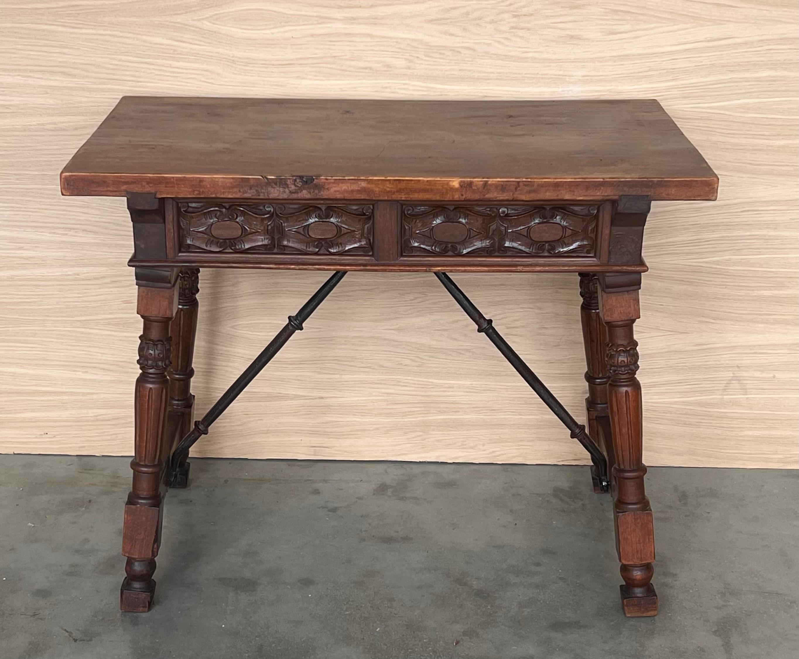 Spanish Console or Side Table with Two Carved sides and Iron Stretcher In Good Condition For Sale In Miami, FL