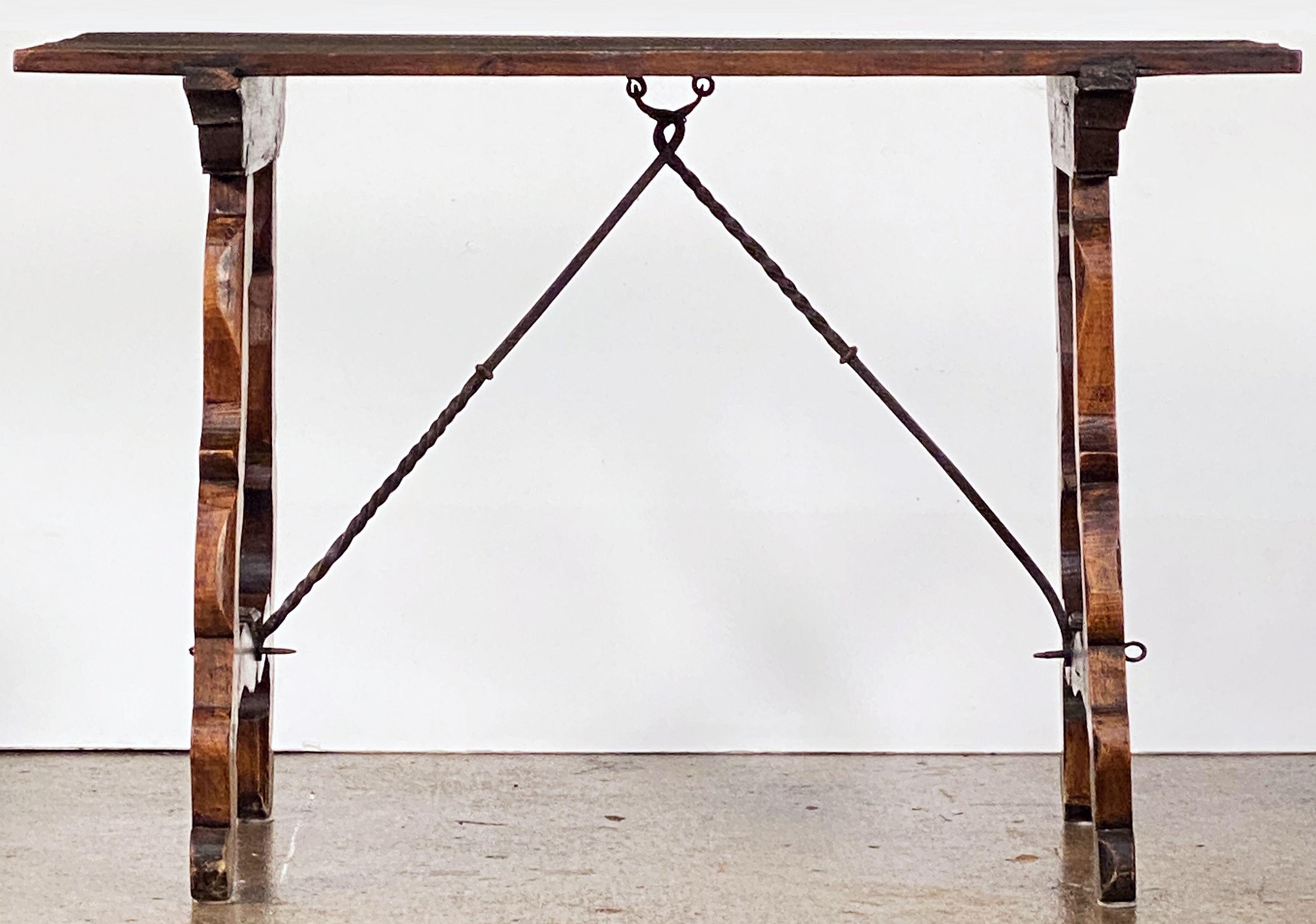 Rustic Spanish Console or Trestle Table of Patinated Walnut with Metal Strap Supports For Sale