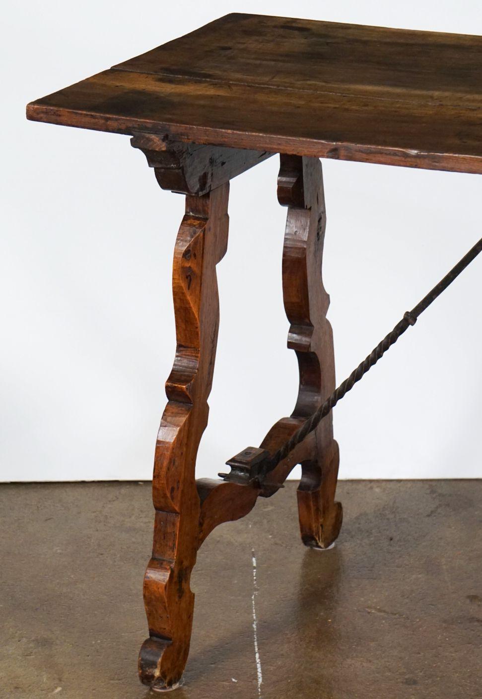 Spanish Console or Trestle Table of Patinated Walnut with Metal Strap Supports In Good Condition For Sale In Austin, TX