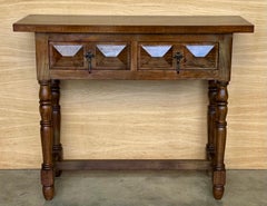 Mesa consola española con dos cajones tallados, años 1900