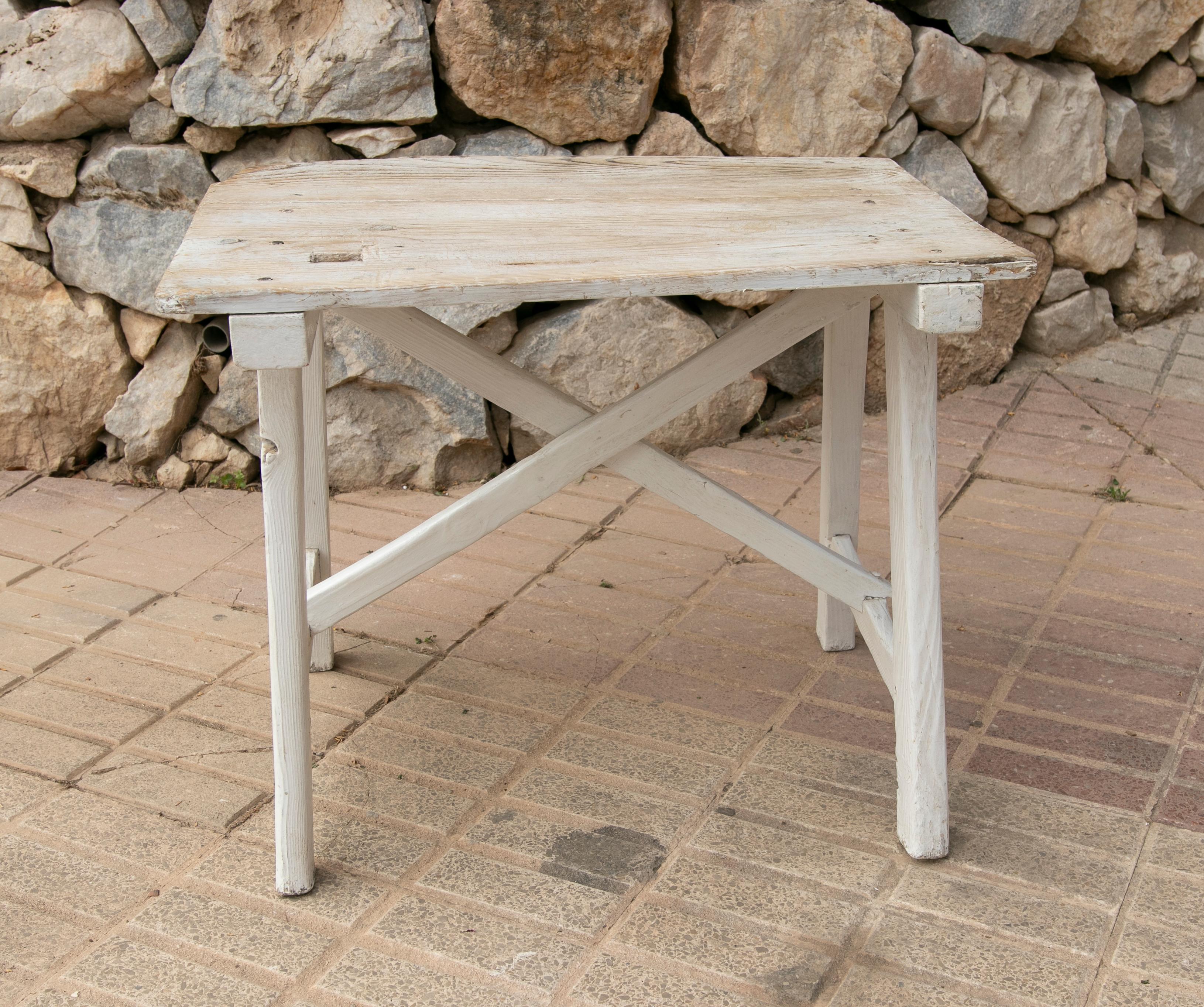 Spanish Country side table made of white painted wood.