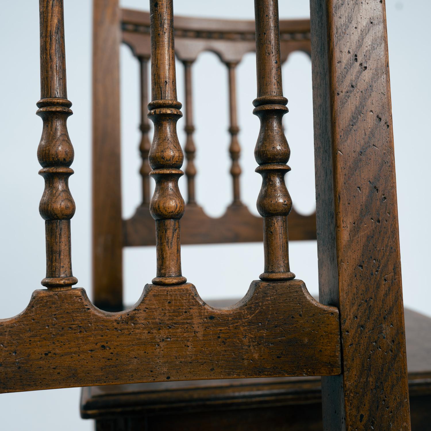 Spanish carved walnut wooden dining chairs, 1970s in vendita 2