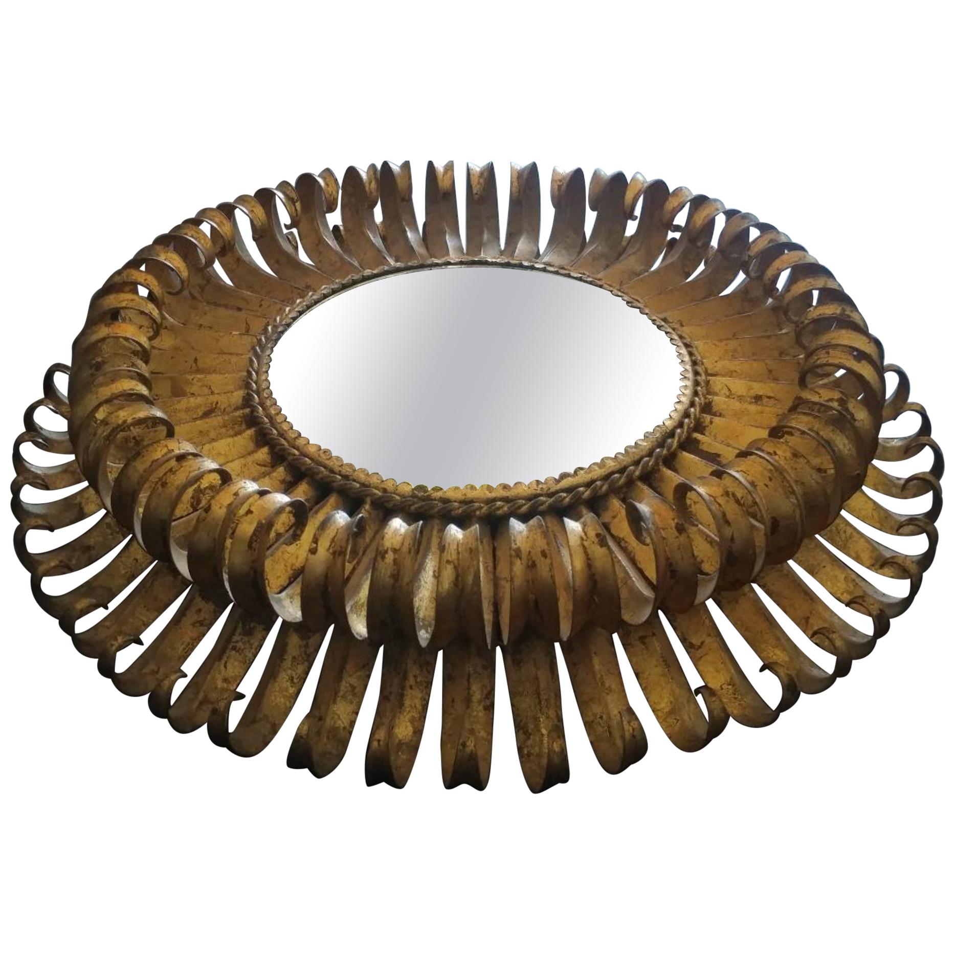 Spanish Double Tiered Sunburst Mirror ca 1950s. Offered by La Porte For Sale