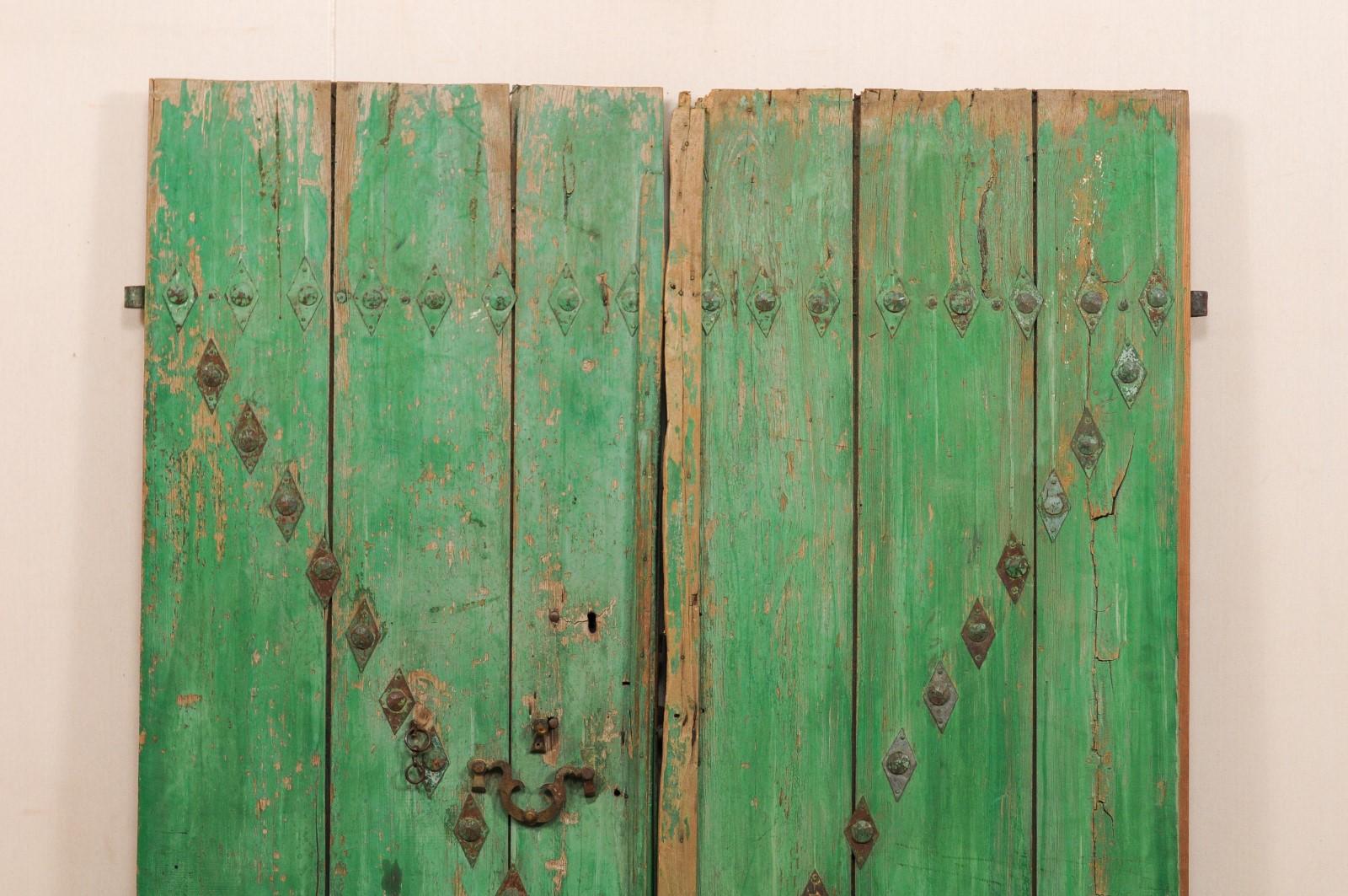 Hand-Carved Spanish Pair Early 19th C. Wooden Doors w/Original Iron Hardware, 6.75 Ft Tall